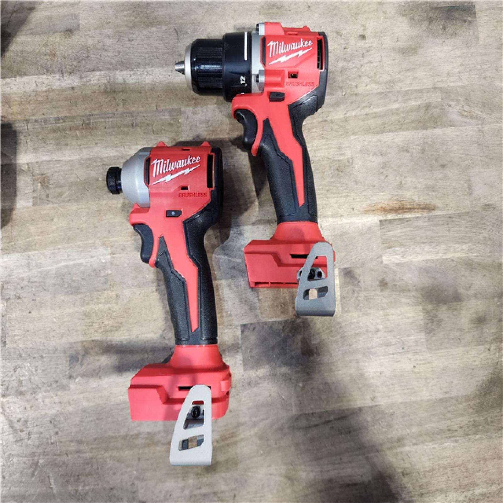 HOUSTON LOCATION - AS-IS Milwaukee M18 18V Lithium-Ion Brushless Cordless Compact Drill/Impact Combo Kit (2-Tool) W/(2) 2.0 Ah Batteries  Charger & Bag
