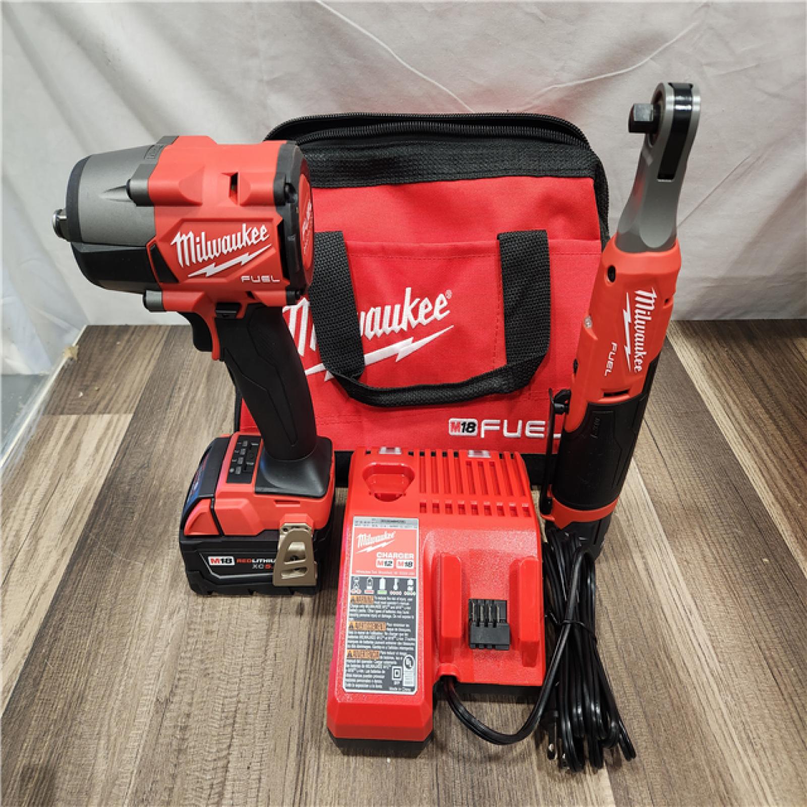 AS-IS- M18 FUEL 18V Cordless Mid Torque 1/2 in. Impact Wrench W/ M12 FUEL 3/8 in. Ratchet & Battery/Charger Combo Kit