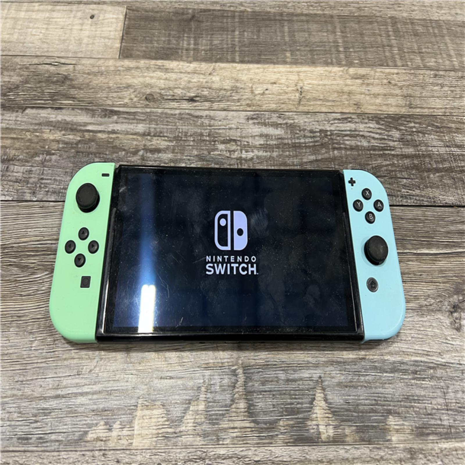AS-IS Nintendo Switch W/ Joy-Con (L)/(R) - Pastel Green/Pastel Blue