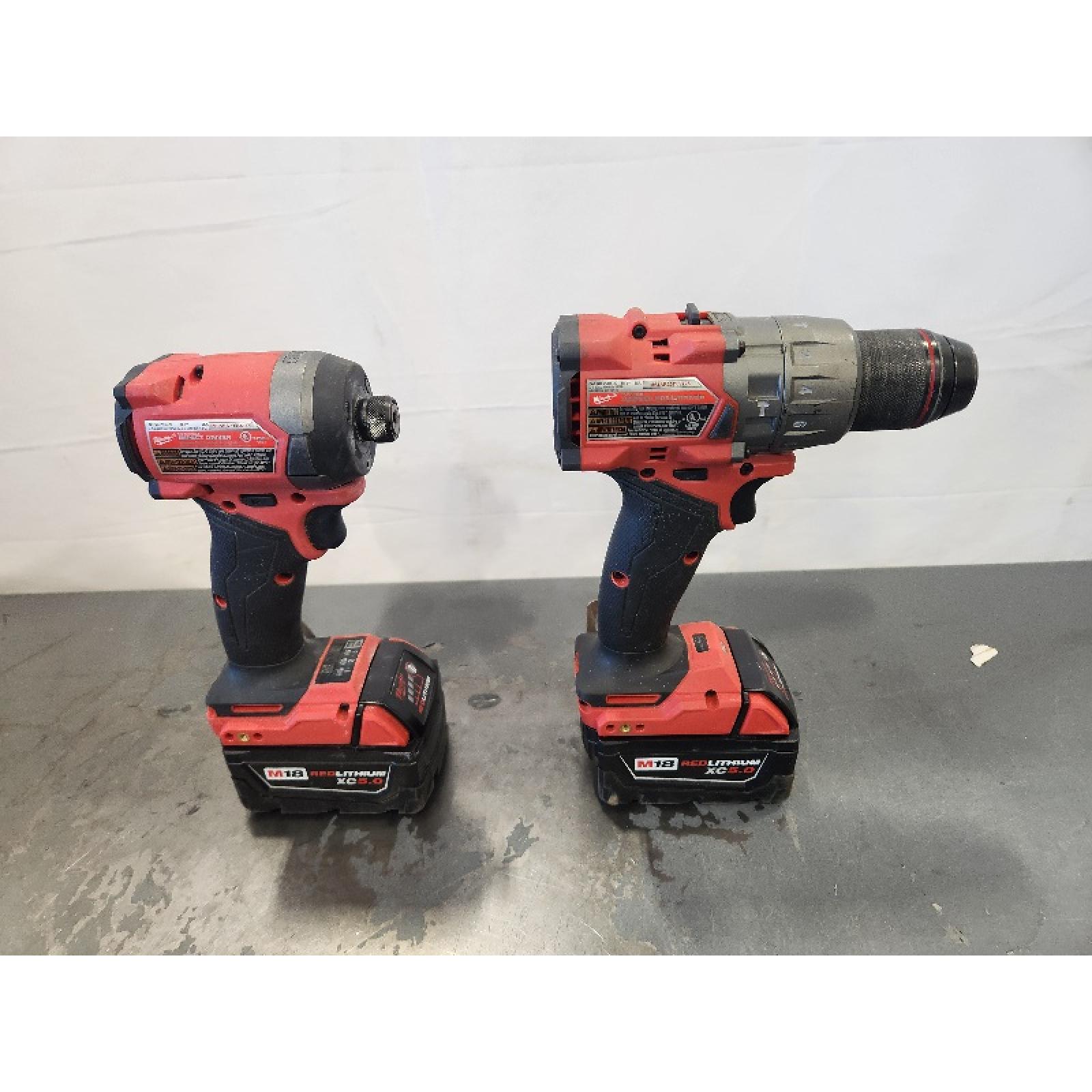 AS-IS- MILWAUKEE FUEL 18V Lithium-Ion Brushless Cordless Hammer Drill and Impact Driver Combo Kit