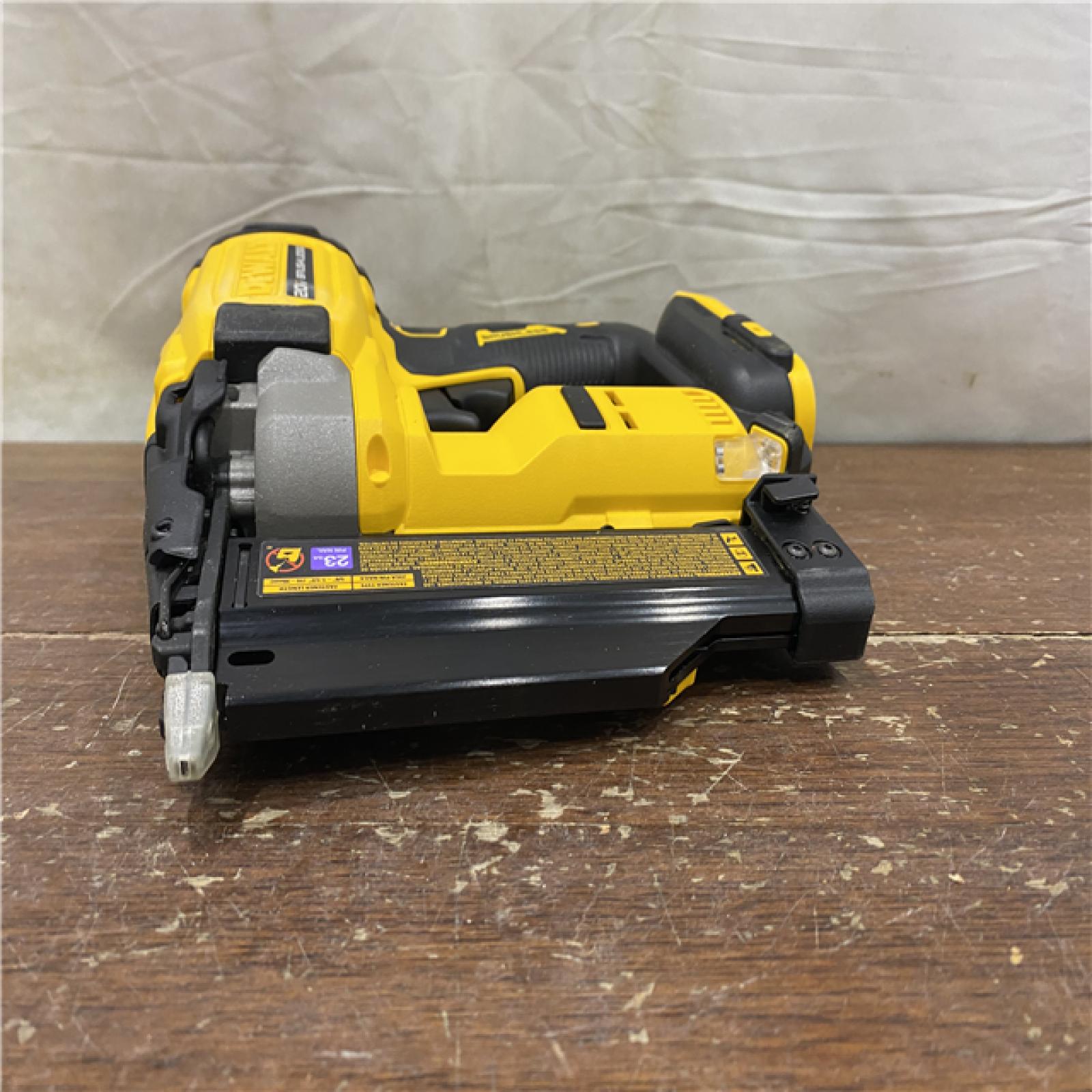 AS-IS  DEWALT ATOMIC 20V MAX Lithium Ion Cordless 23 Gauge Pin Nailer Kit with 3.0Ah Battery and Charger
