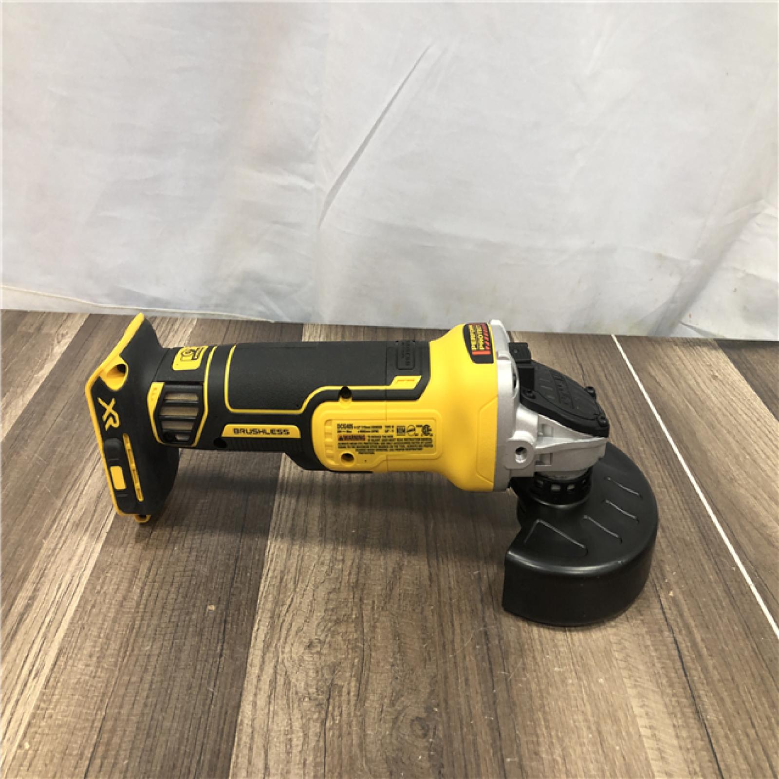 AS-IS DEWALT 20V MAX XR Cordless Brushless 4.5 in. Slide Switch Small Angle Grinder with Kickback Brake (Tool Only)