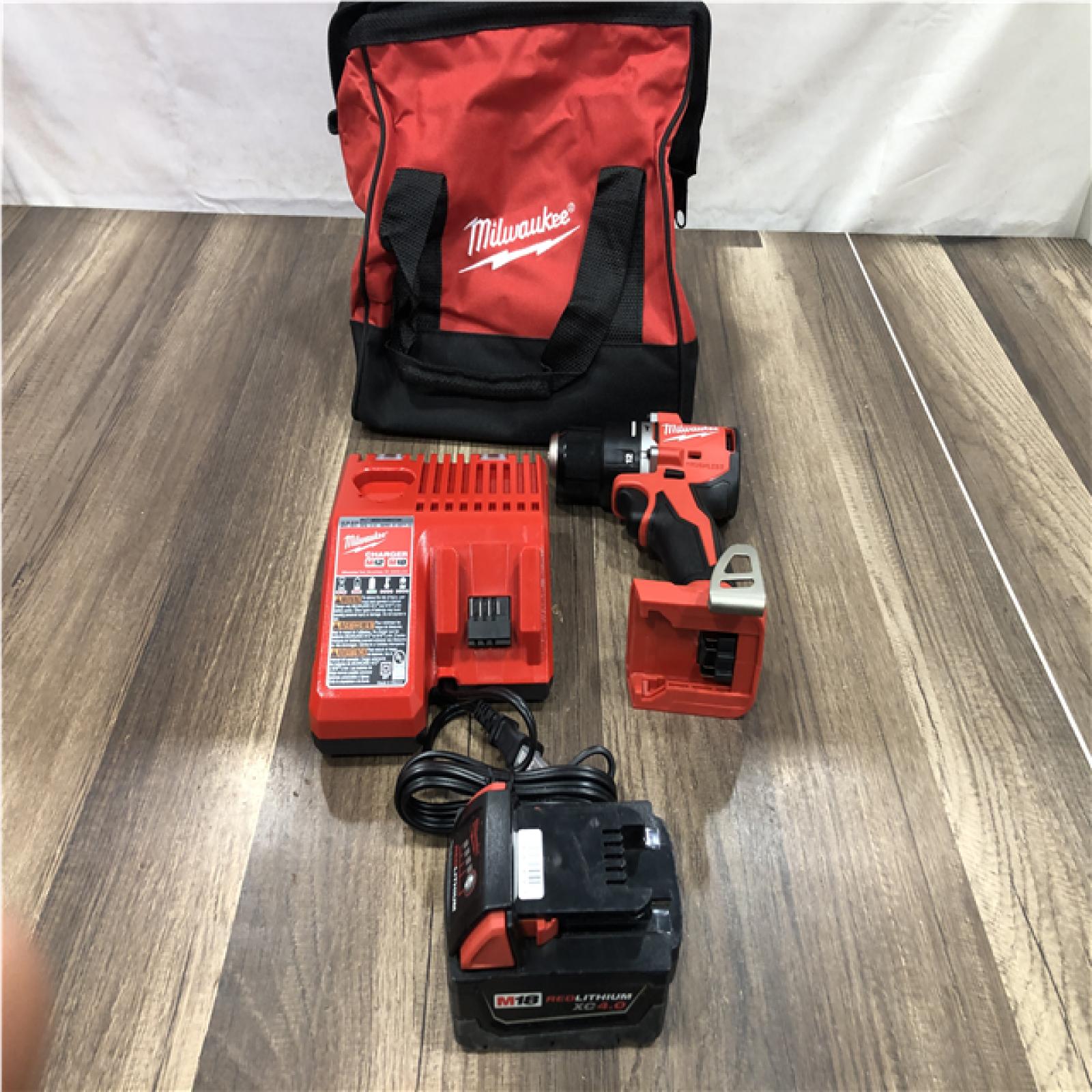 AS-IS Milwaukee 18V Lithium-Ion Brushless Cordless 1/2 in. Compact Hammer Drill/Driver Kit