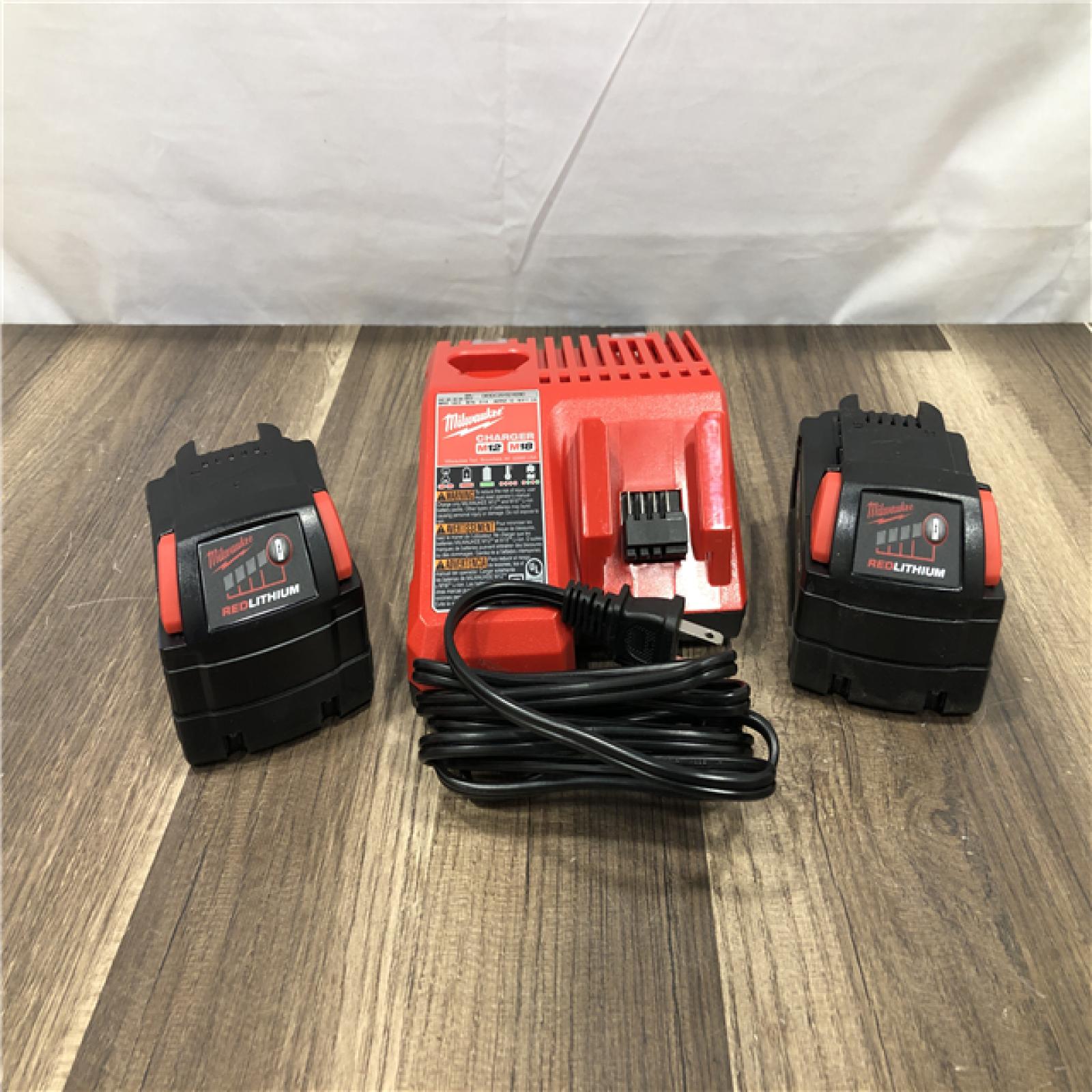 AS-IS Milwaukee 18-Volt Lithium-Ion XC Starter Kit with Two 5.0Ah Batteries and Charger
