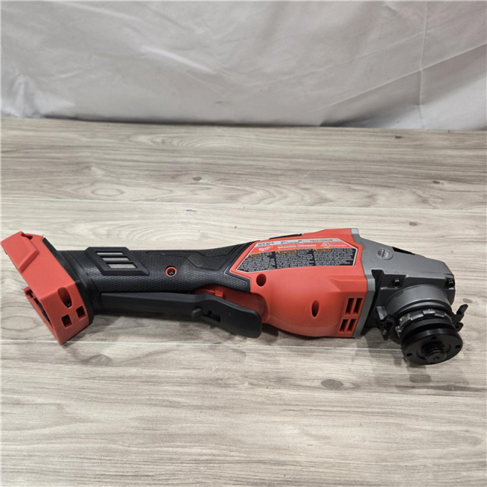 AS-IS Milwaukee M18 FUEL 4-1/2-6 Cordless Braking Grinder  Paddle Switch (Tool-Only)