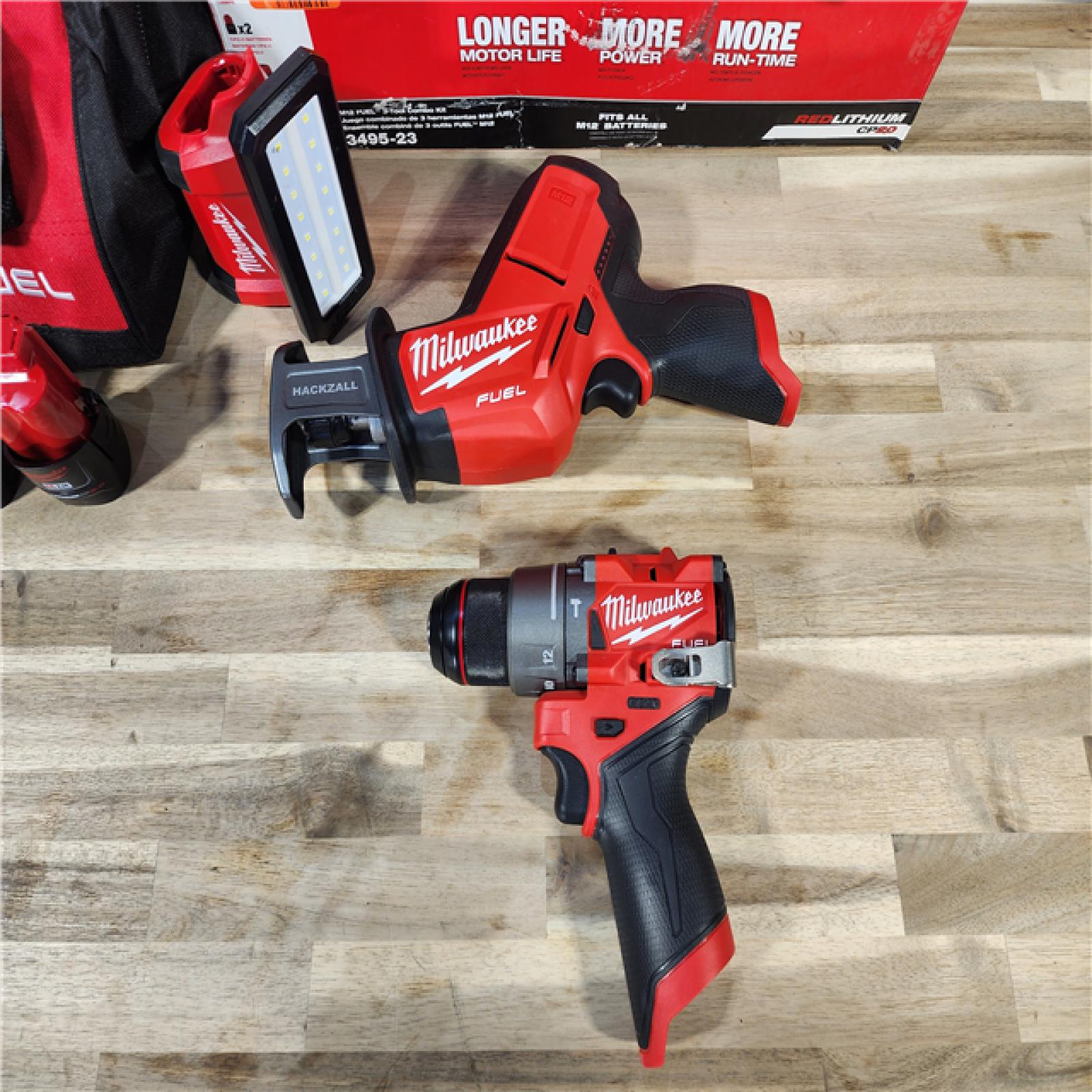 HOUSTON LOCATION - AS-IS (APPEARS LIKE NEW) M12 FUEL 12-Volt Li-Ion Brushless Cordless Hammer Drill Combo Kit, Reciprocating Saw, Flood Light W/2 Batteries (3-Tool)