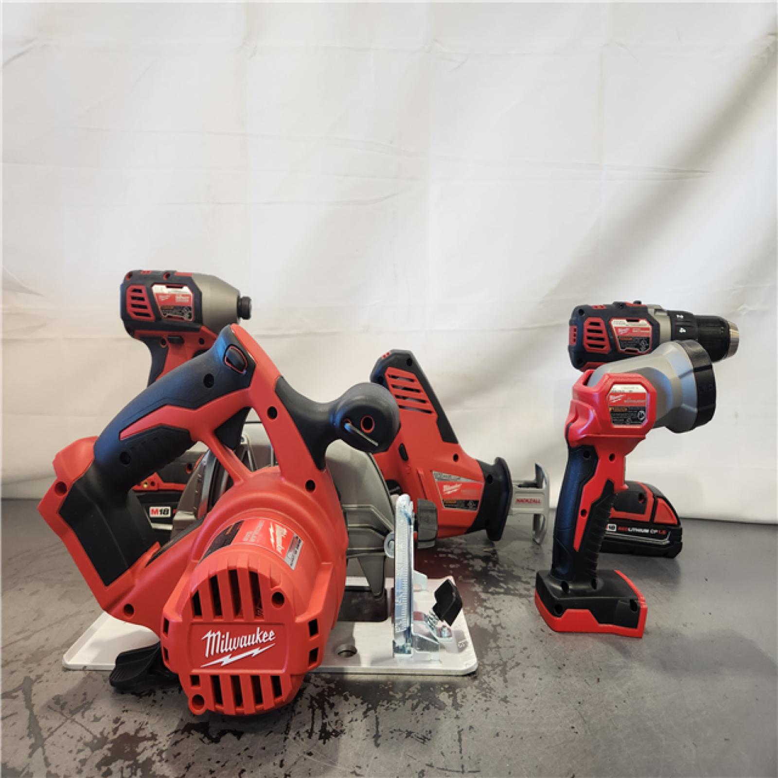 AS-IS- Milwaukee M18 18-Volt Lithium-Ion Cordless Combo Tool Kit (5-Tool) with (1) 3.0Ah and (1) 1.5Ah Battery  (1) Charger  (1) Tool Bag