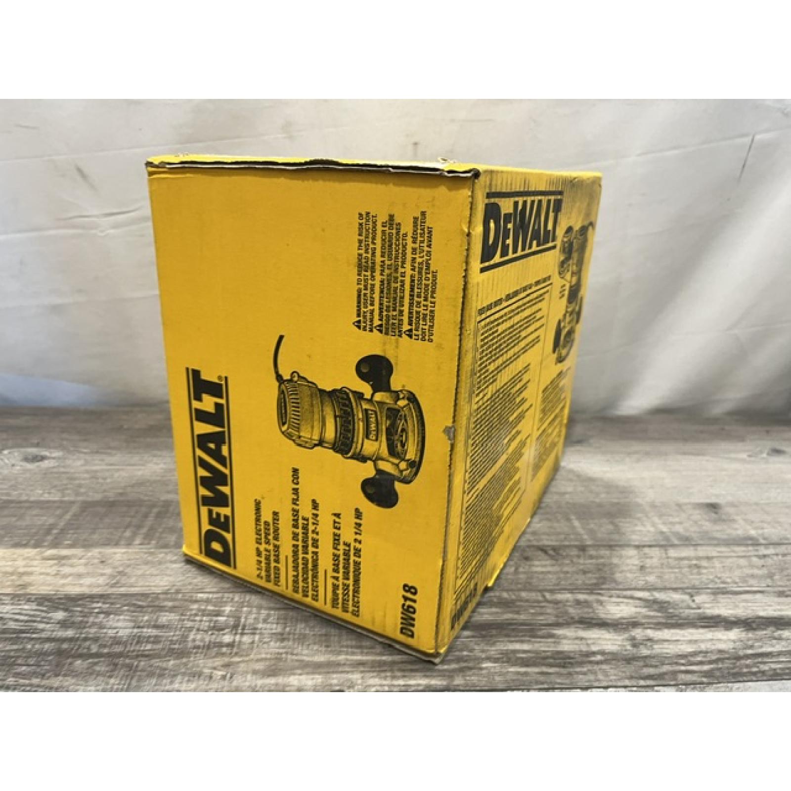 NEW - DEWALT 12 Amp Corded 2-1/4 Horsepower Electronic Variable Speed Fixed Base Router with Soft Start