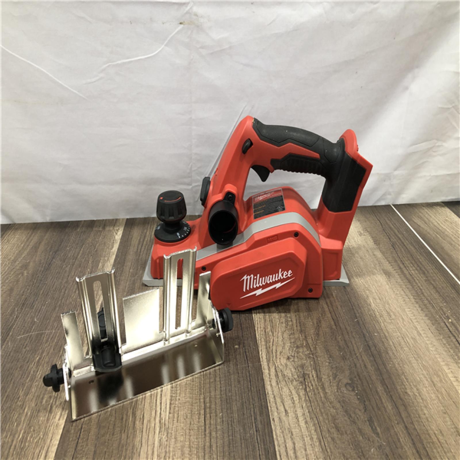 AS-IS Milwaukee M18 18V Lithium-Ion Cordless 3-1/4 in. Planer (Tool-Only)
