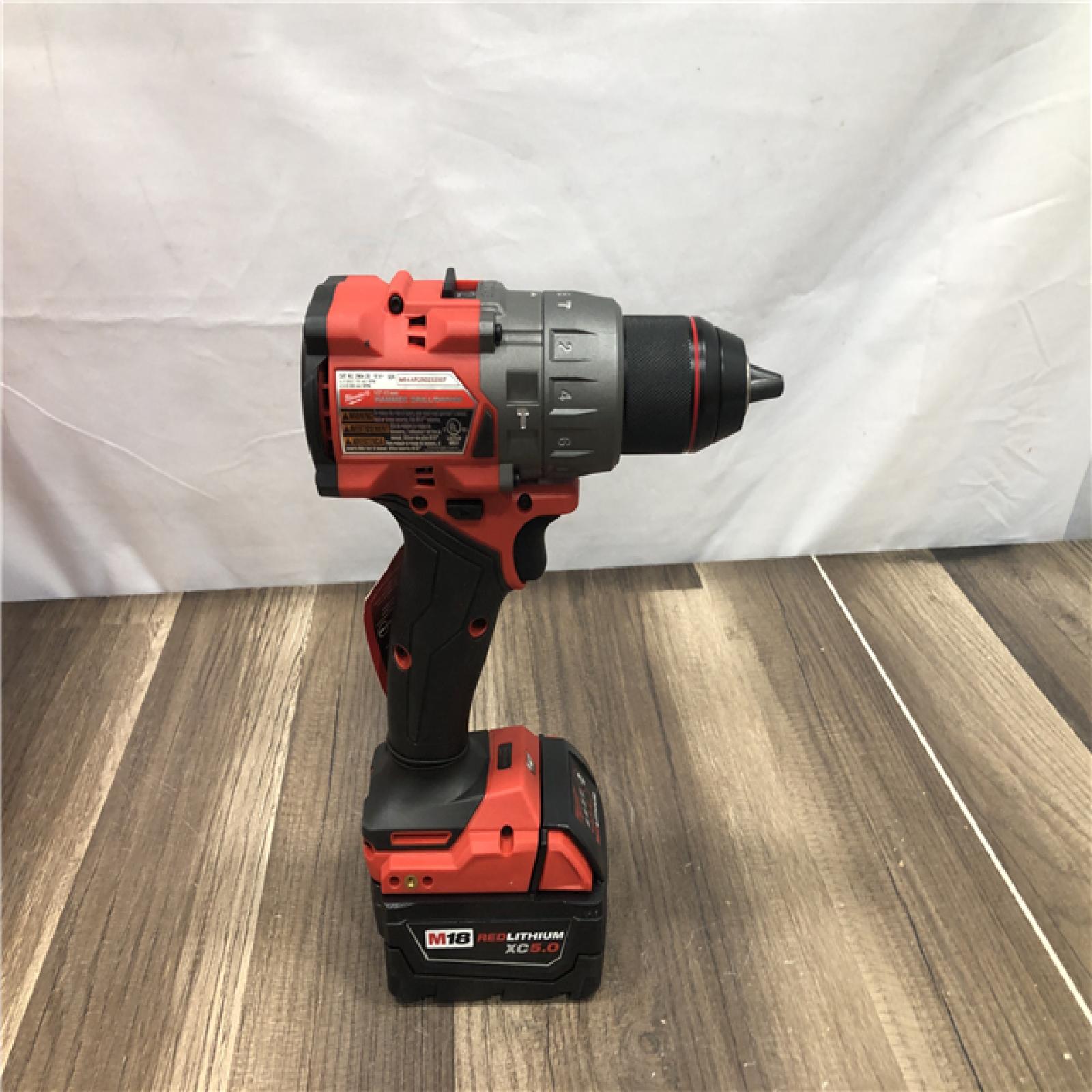 AS-IS Milwaukee FUEL 18V Lithium-Ion Brushless Cordless 1/2 in. Hammer Drill Driver Kit