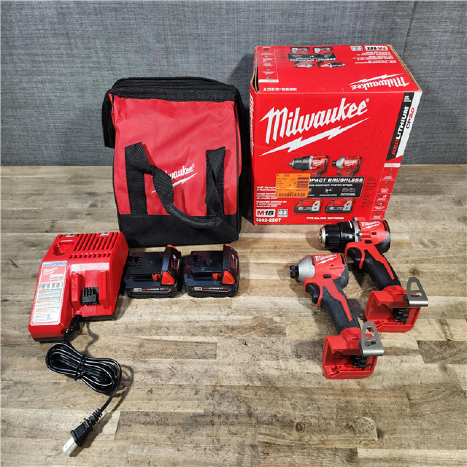 HOUSTON LOCATION - AS-IS Milwaukee 18V Lithium-Ion Brushless Cordless Compact Drill/Impact Combo Kit