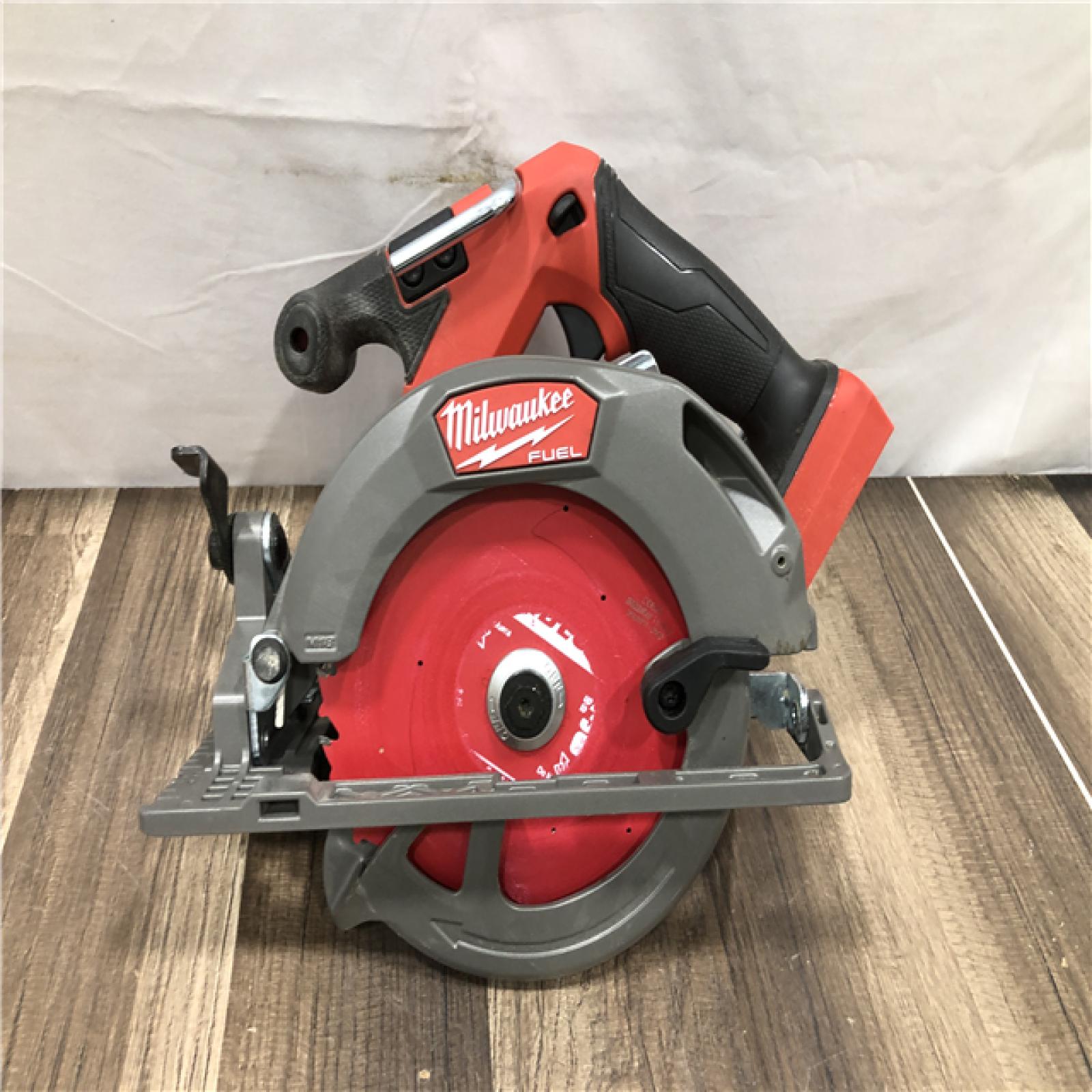 AS-IS Milwaukee FUEL 18V Lithium-Ion Brushless Cordless 6-1/2 in. Circular Saw (Tool-Only)