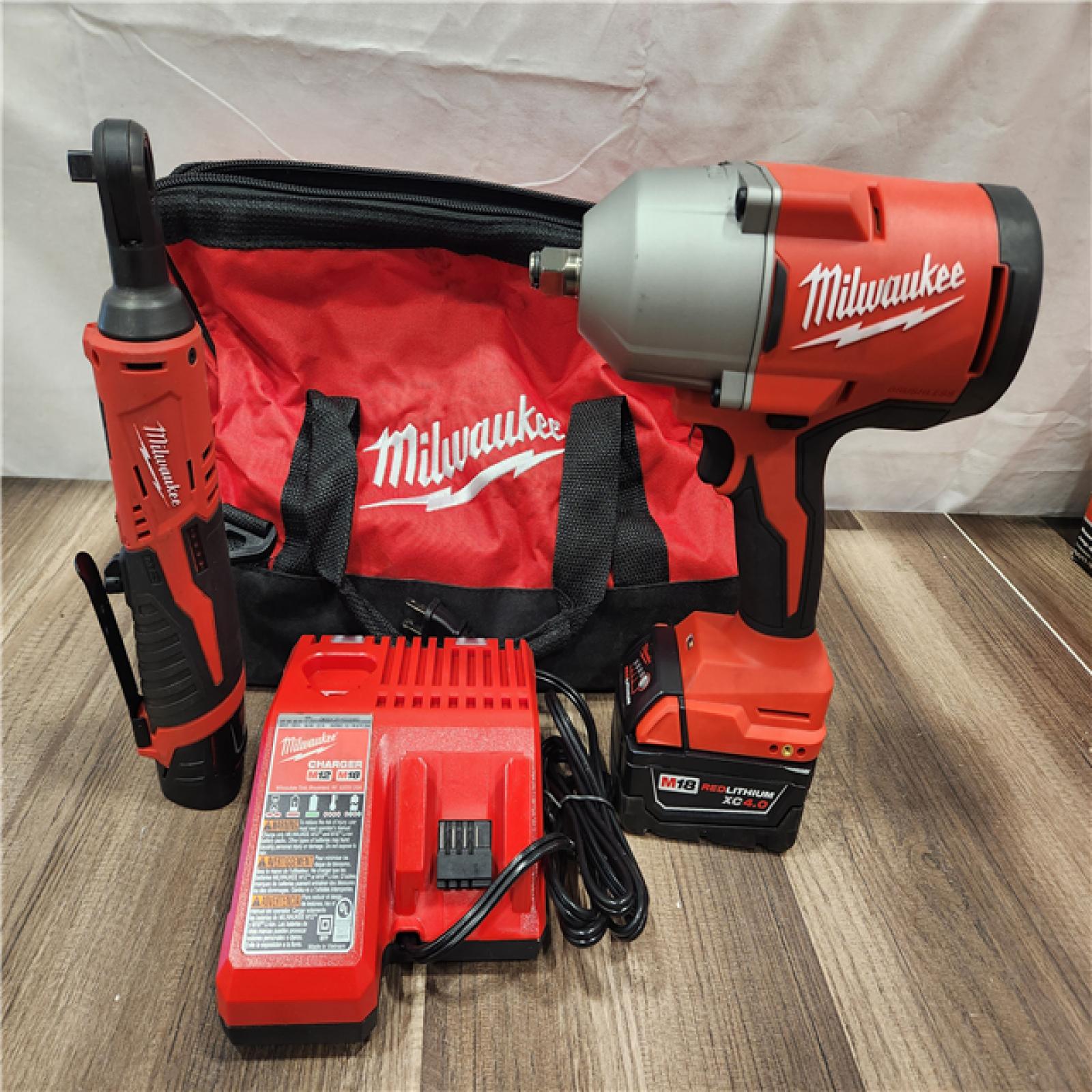 AS-IS- Milwaukee M12/M18 12/18V Lithium-Ion Cordless 3/8 in. Ratchet and 1/2 in. High Torque Impact Wrench with Friction Ring Combo Kit