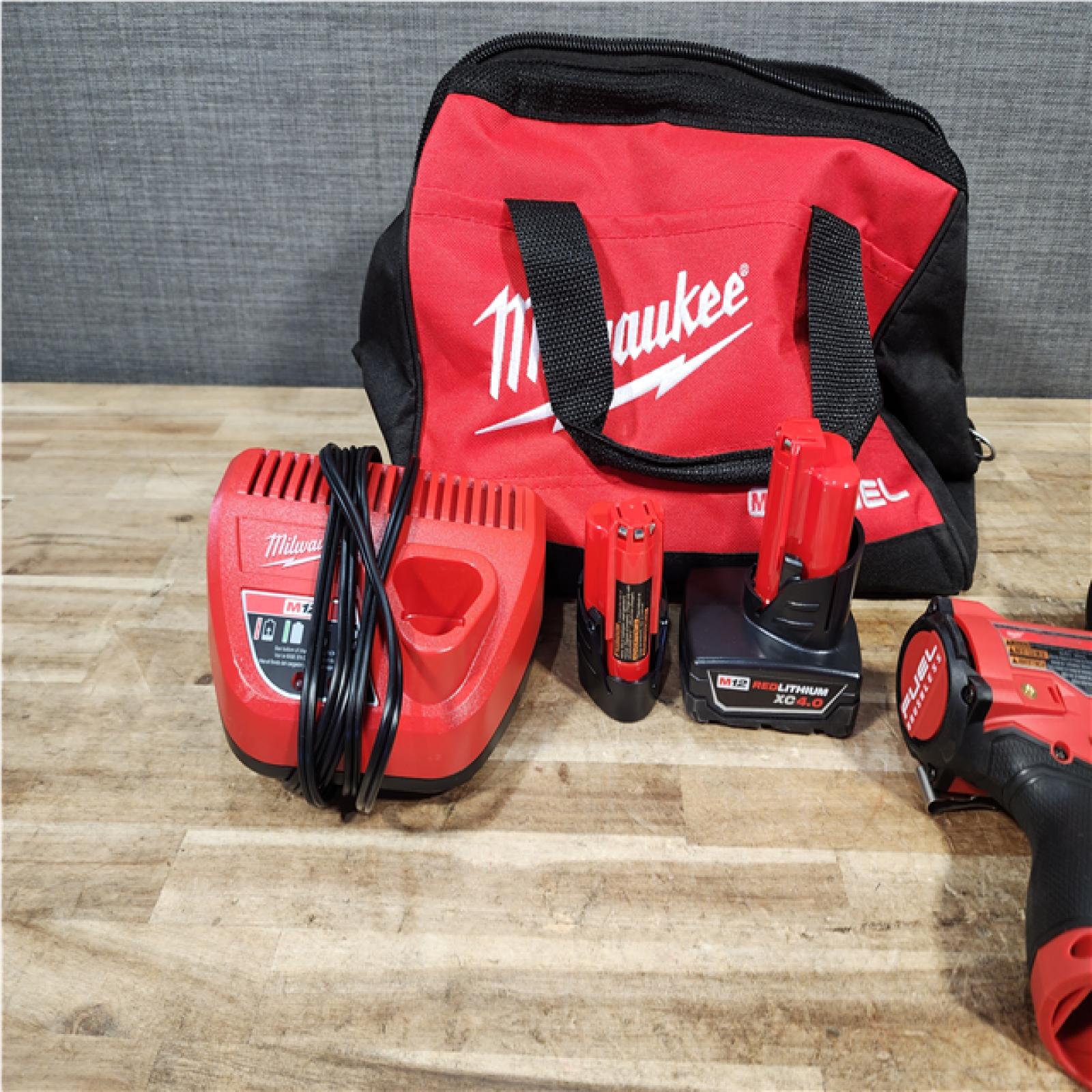 HOUSTON LOCATION - AS - IS Milwaukee 2 Tool Combo Kit W/ (2) Battery & Charger
