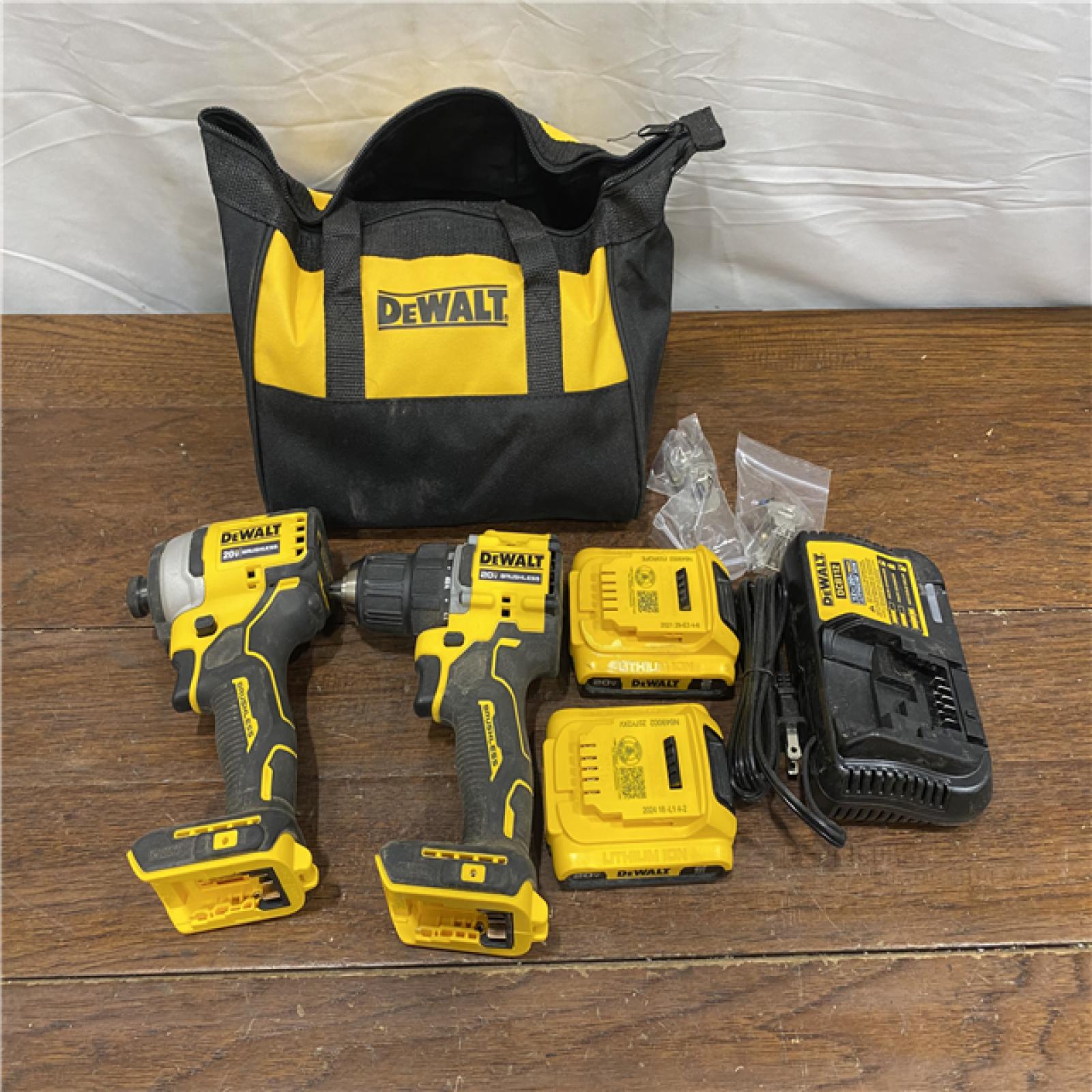 AS-IS DEWALT ATOMIC 20-Volt MAX Lithium-Ion Cordless Combo Kit (2-Tool) with (2) 2.0Ah Batteries, Charger and Bag