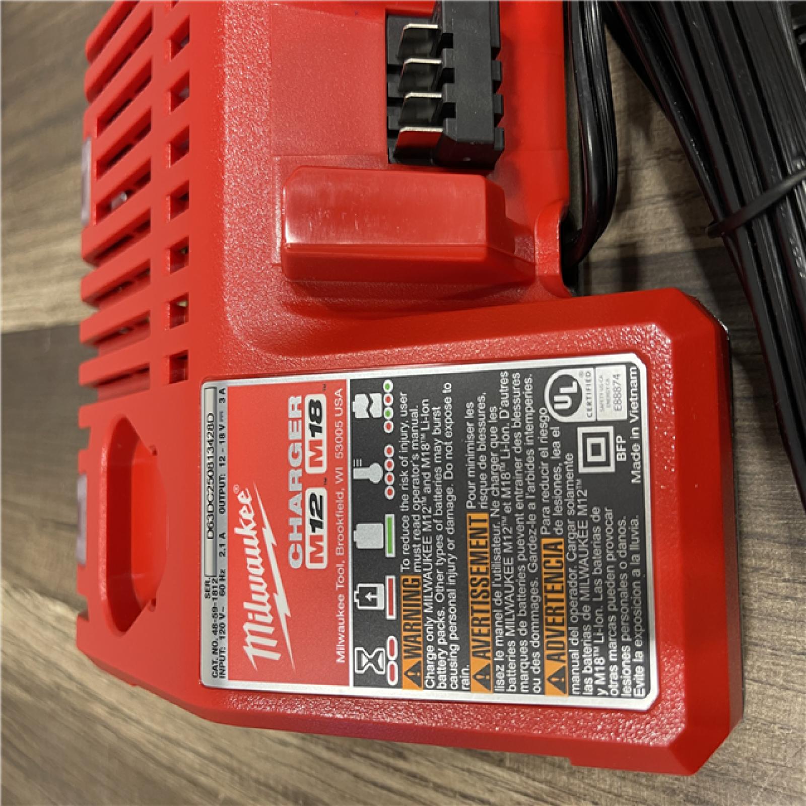 AS-IS Milwaukee M18 18-Volt Lithium-Ion XC Starter Kit with Two 5.0Ah Batteries and Charger