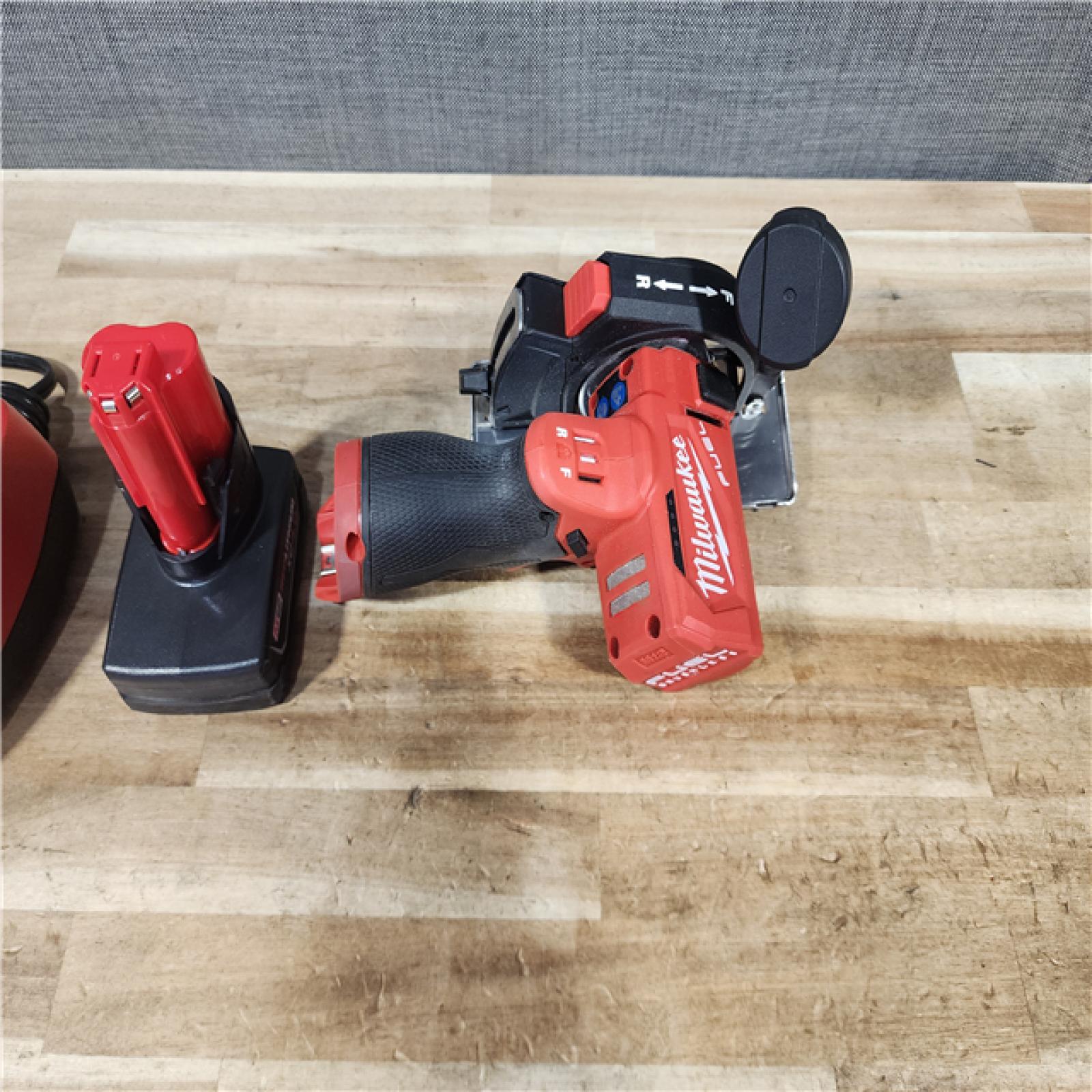 HOUSTON LOCATION - AS - IS Milwaukee FUEL 12V Lithium-Ion Brushless Cordless 3 in. Cut Off Saw W/ BATTERY & CHARGER