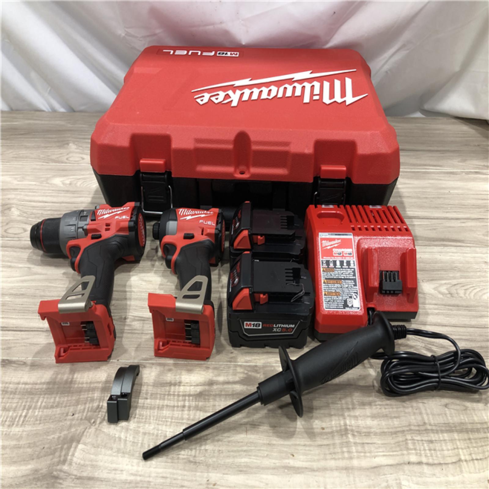 AS-IS Milwaukee FUEL 18V Lithium-Ion Cordless Hammer Drill and Impact Driver Combo Kit