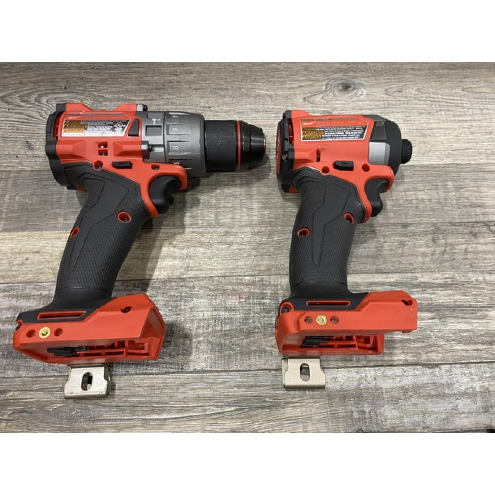 AS-IS Milwaukee FUEL 18V Lithium-Ion Brushless Cordless Hammer Drill and Impact Driver Combo Kit