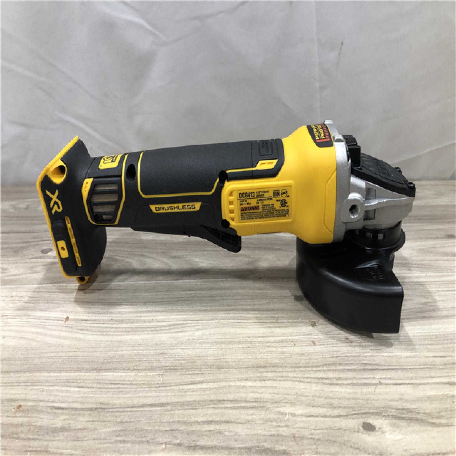 AS-IS DEWALT 20V MAX XR Cordless 4.5 in. Paddle Switch Small Angle Grinder (Tool Only)