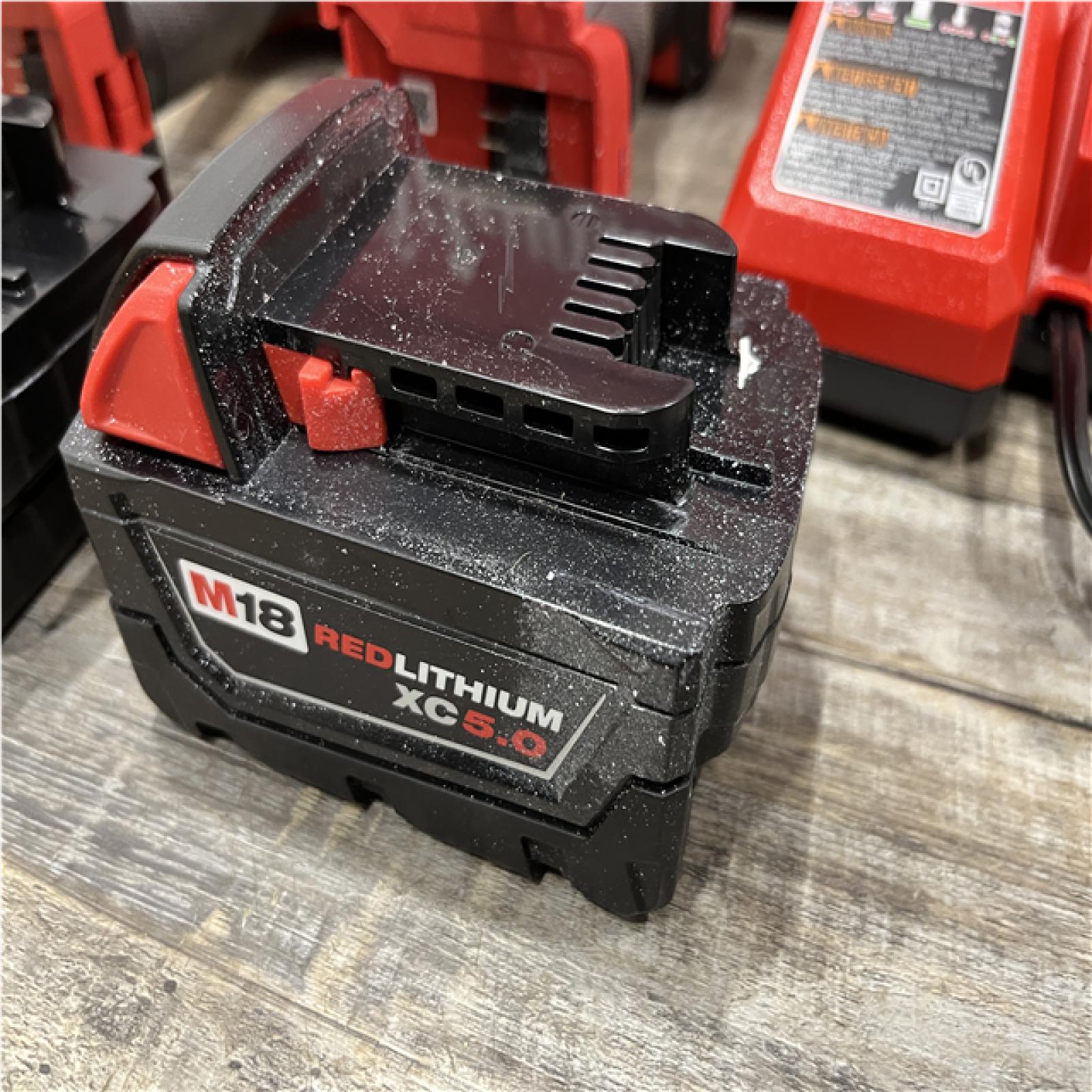 AS-IS Milwaukee FUEL 18V Lithium-Ion Brushless Cordless Hammer Drill and Impact Driver Combo Kit