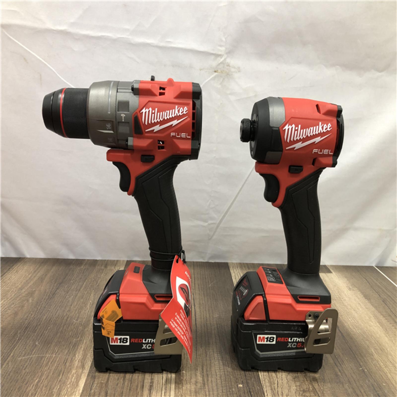 AS-IS Milwaukee FUEL 18V Lithium-Ion Brushless Cordless Hammer Drill and Impact Driver Combo Kit