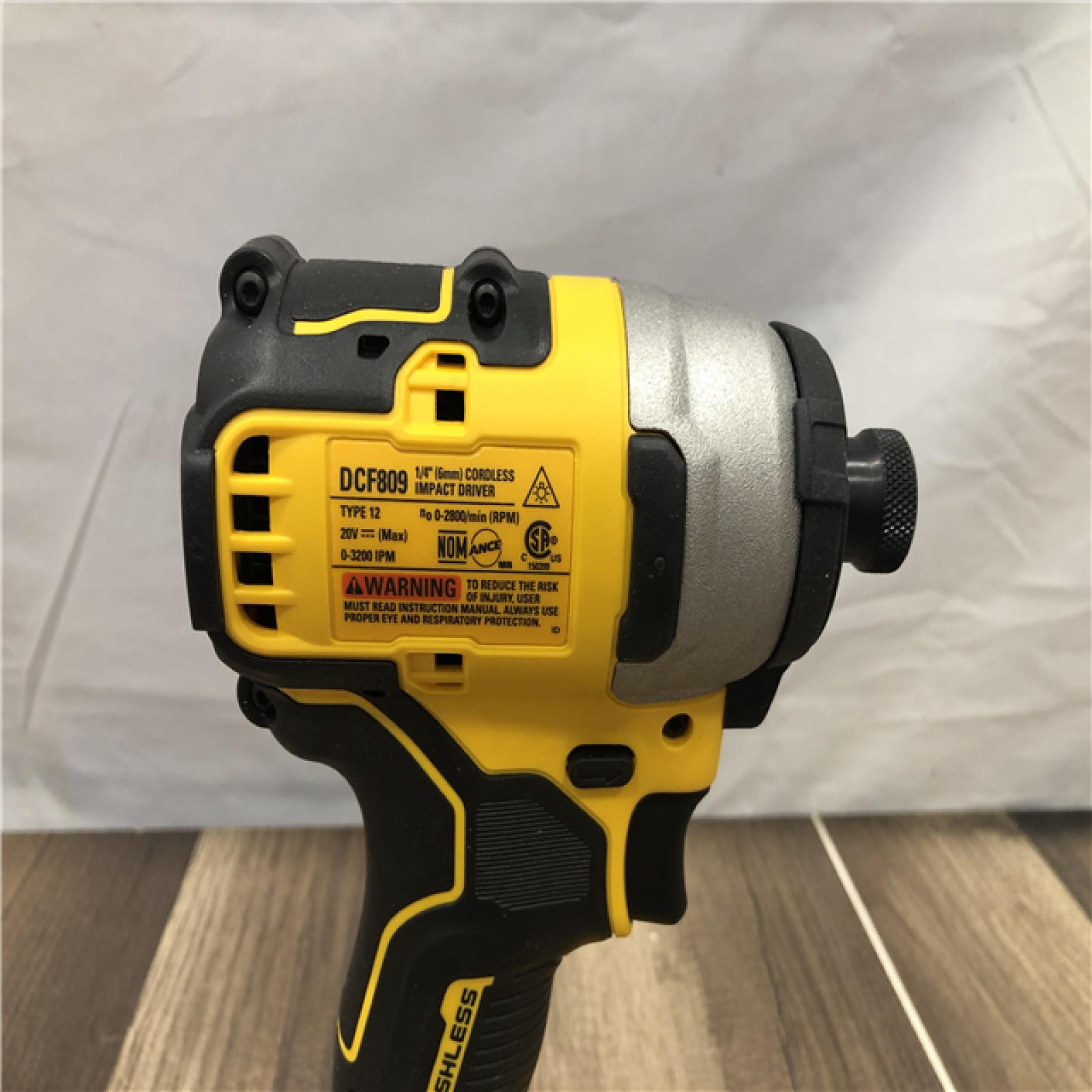 AS-IS DEWALT Atomic 20V Max Lithium-Ion Brushless Cordless Compact 1/4 in. Impact Driver Kit