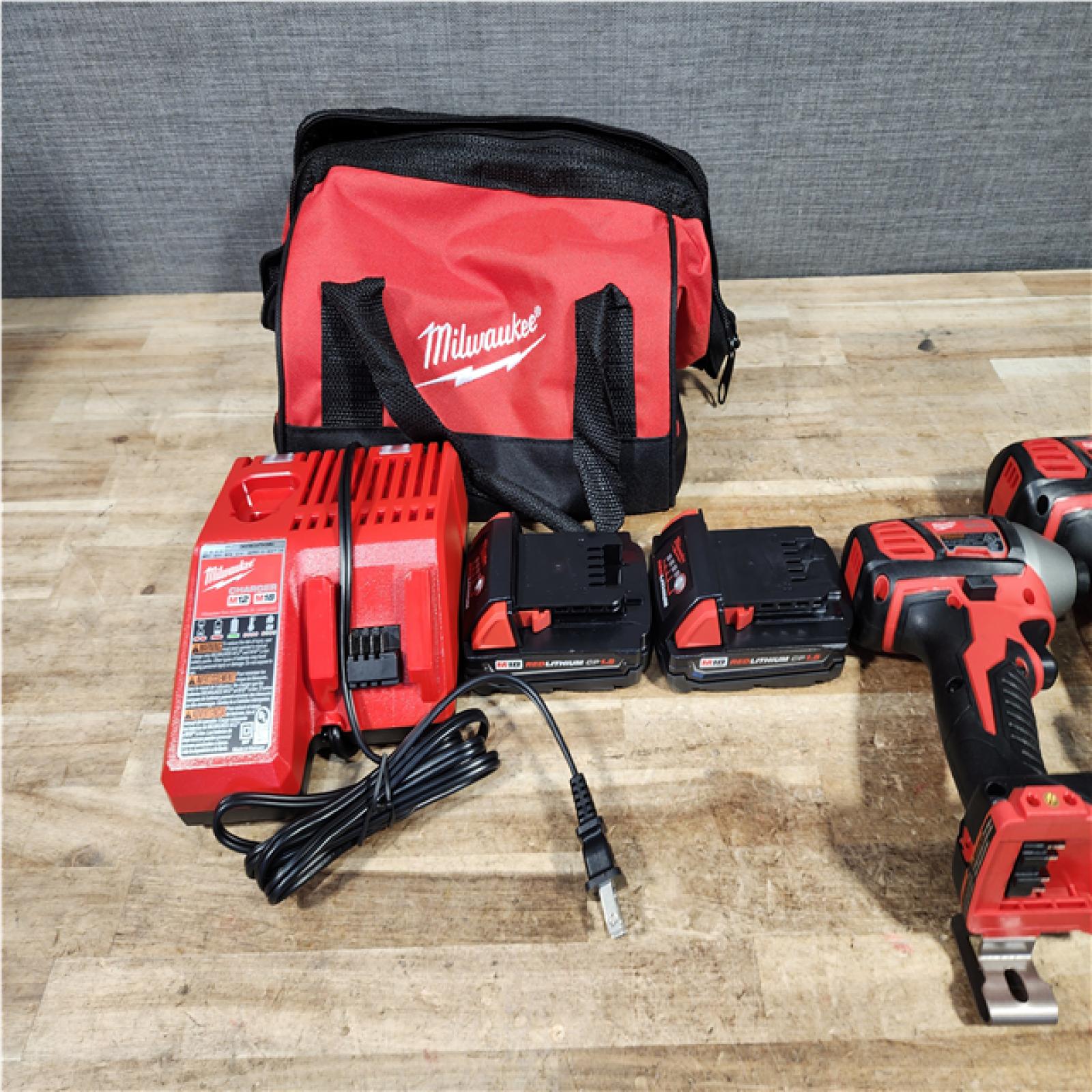 HOUSTON LOCATION - AS - IS Milwaukee 18V Lithium-Ion Cordless Drill Driver/Impact Driver Combo Kit