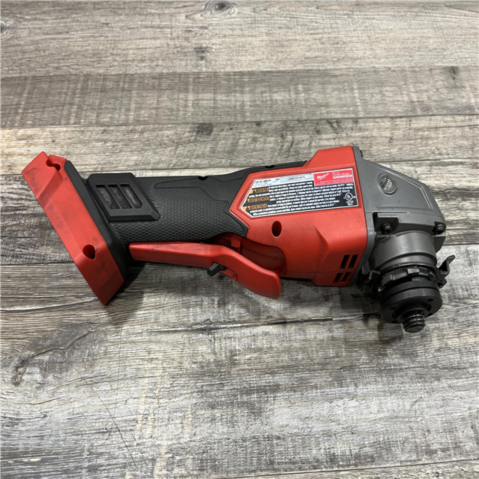 AS-IS Milwaukee FUEL 18V Lithium-Ion Brushless Cordless 4-1/2 in./5 in. Grinder w/Paddle Switch (Tool-Only)