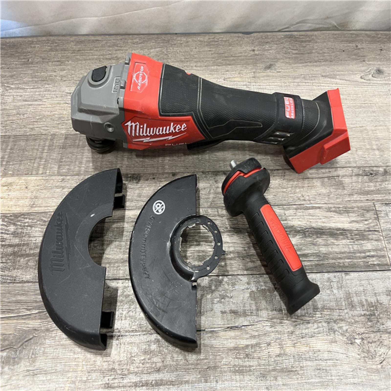 AS-IS Milwaukee FUEL 18-Volt Lithium-Ion Brushless Cordless 4-1/2 in./6 in. Braking Grinder with Paddle Switch (Tool-Only)