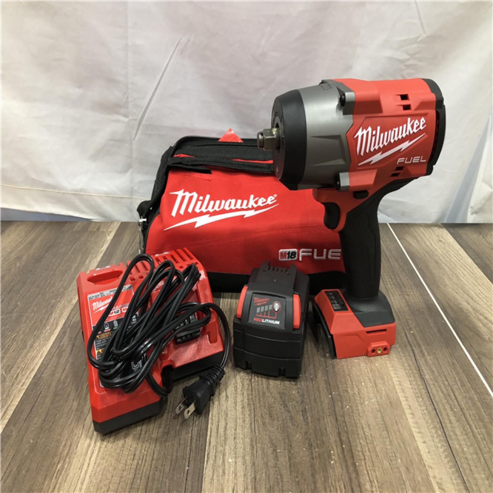 AS-IS  Milwaukee FUEL 18V Lithium-Ion Brushless Cordless 1/2 in. Impact Wrench w/Friction Ring Kit