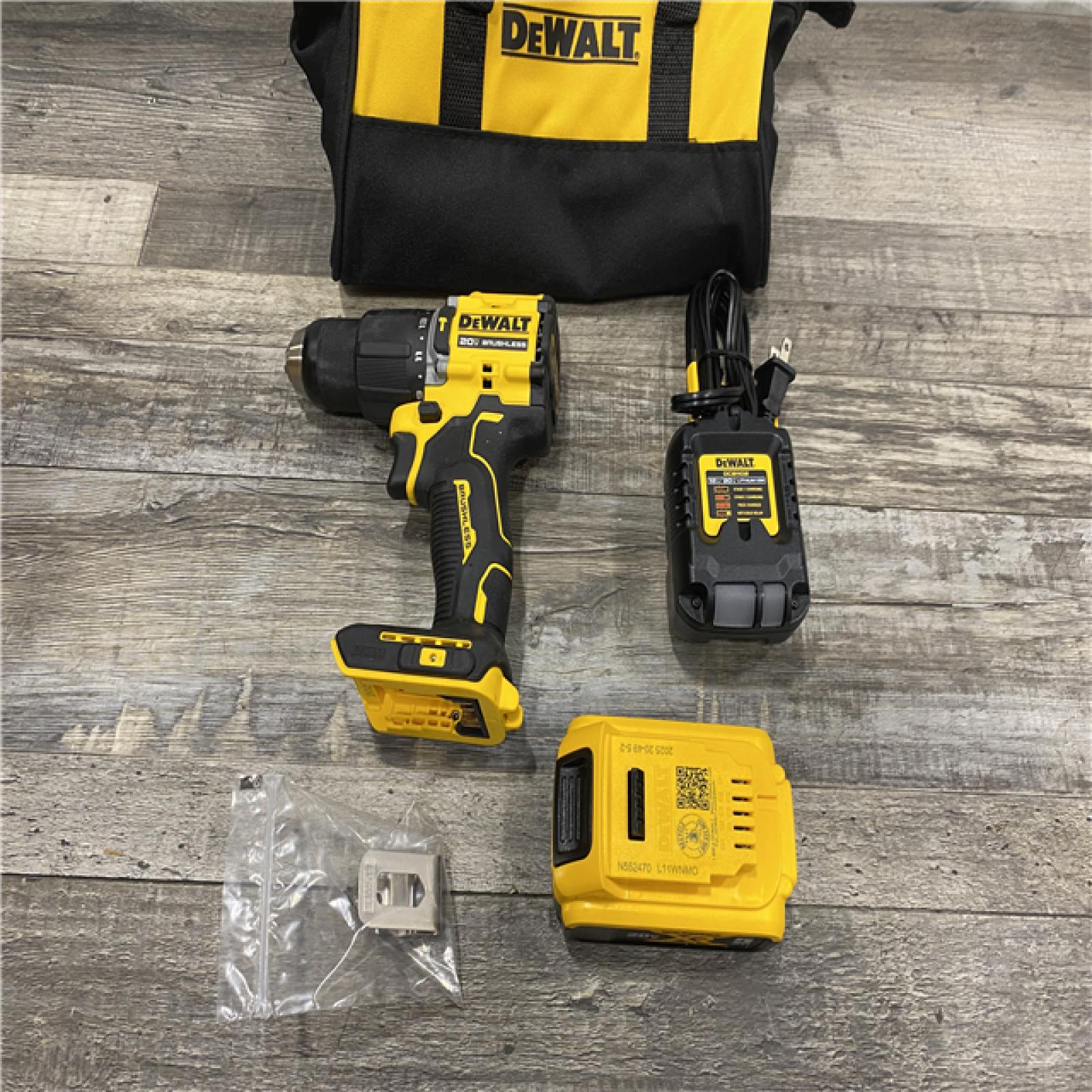 AS-IS DEWALT ATOMIC 20V Lithium-Ion Cordless 1/2 in. Hammer Drill Kit with 5.0 Ah Battery and Charger