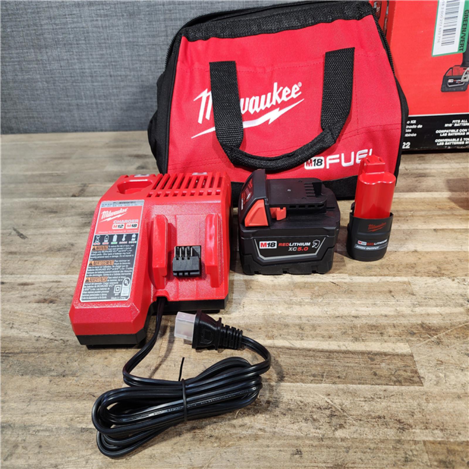 HOUSTON LOCATION - AS-IS (APPEARS LIKE NEW) Milwaukee FUEL 18V Cordless Mid Torque 1/2 in. Impact Wrench w/ M12 FUEL 3/8 in. Ratchet & Battery/Charger Combo Kit