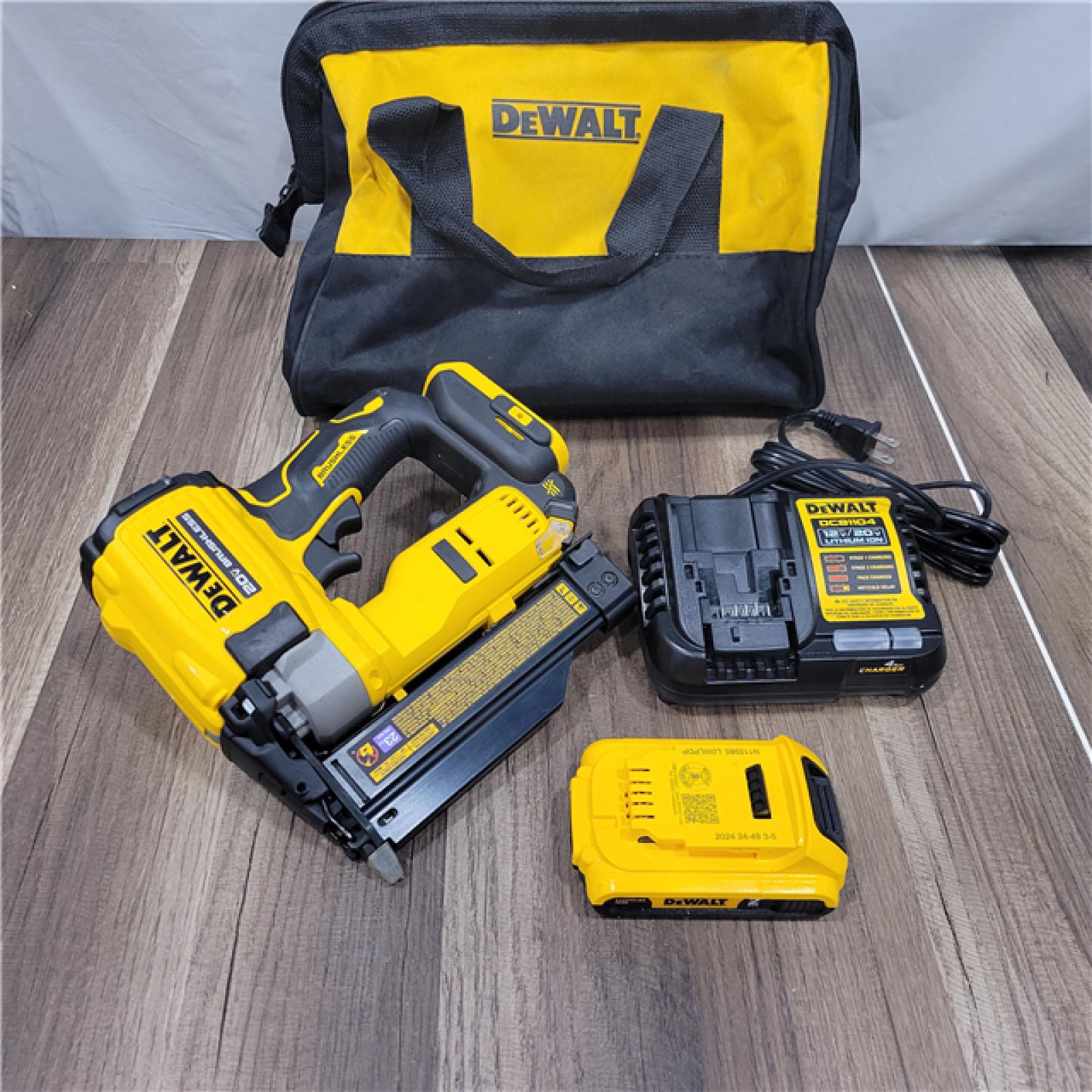 AS-IS DEWALT ATOMIC 20V MAX Lithium Ion Cordless 23 Gauge Pin Nailer Kit with 3.0Ah Battery and Charger