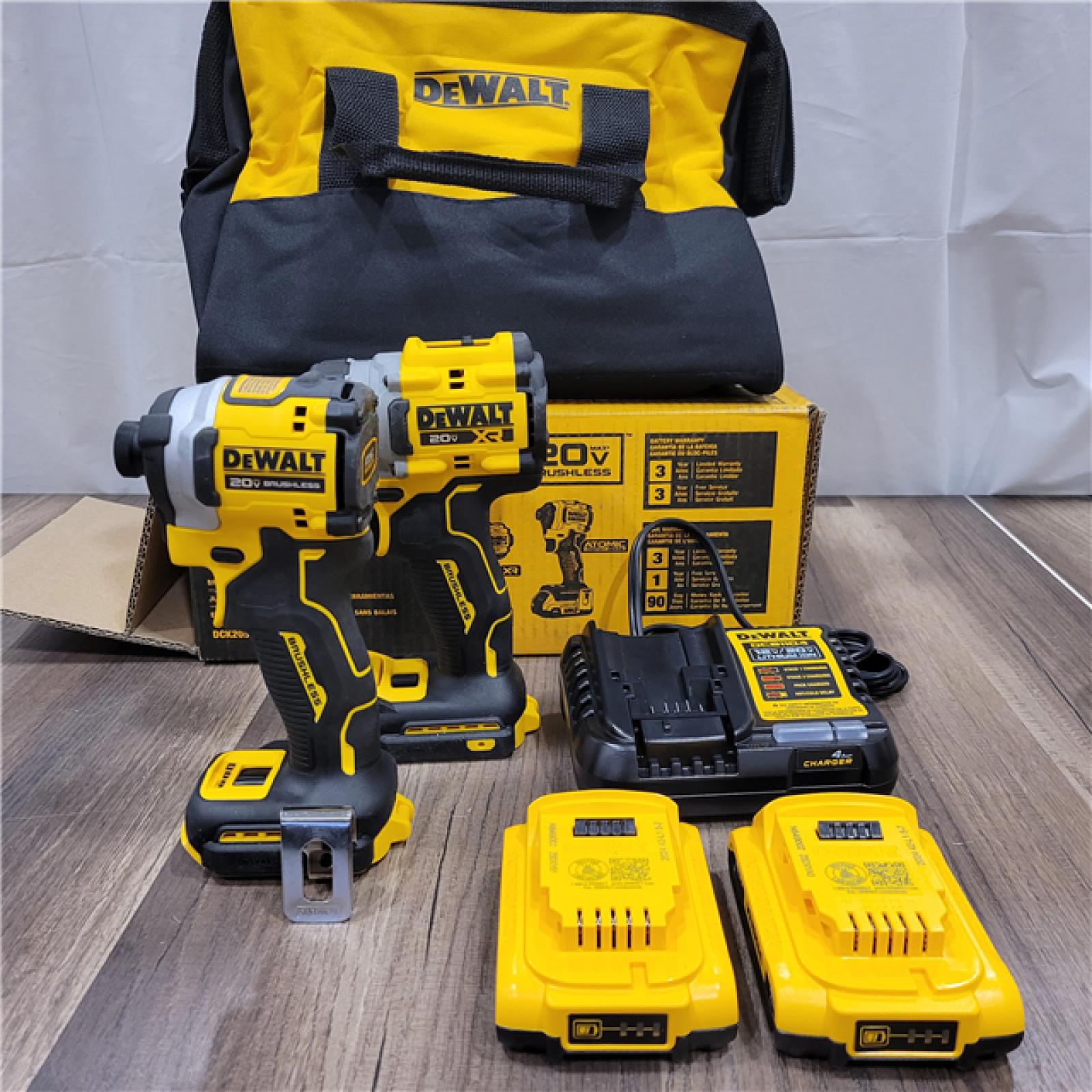 AS-IS DEWALT 20V MAX XR Cordless Drill/Driver, ATOMIC Impact Driver 2 Tool Combo Kit, (2) 2.0Ah Batteries, Charger, and Bag