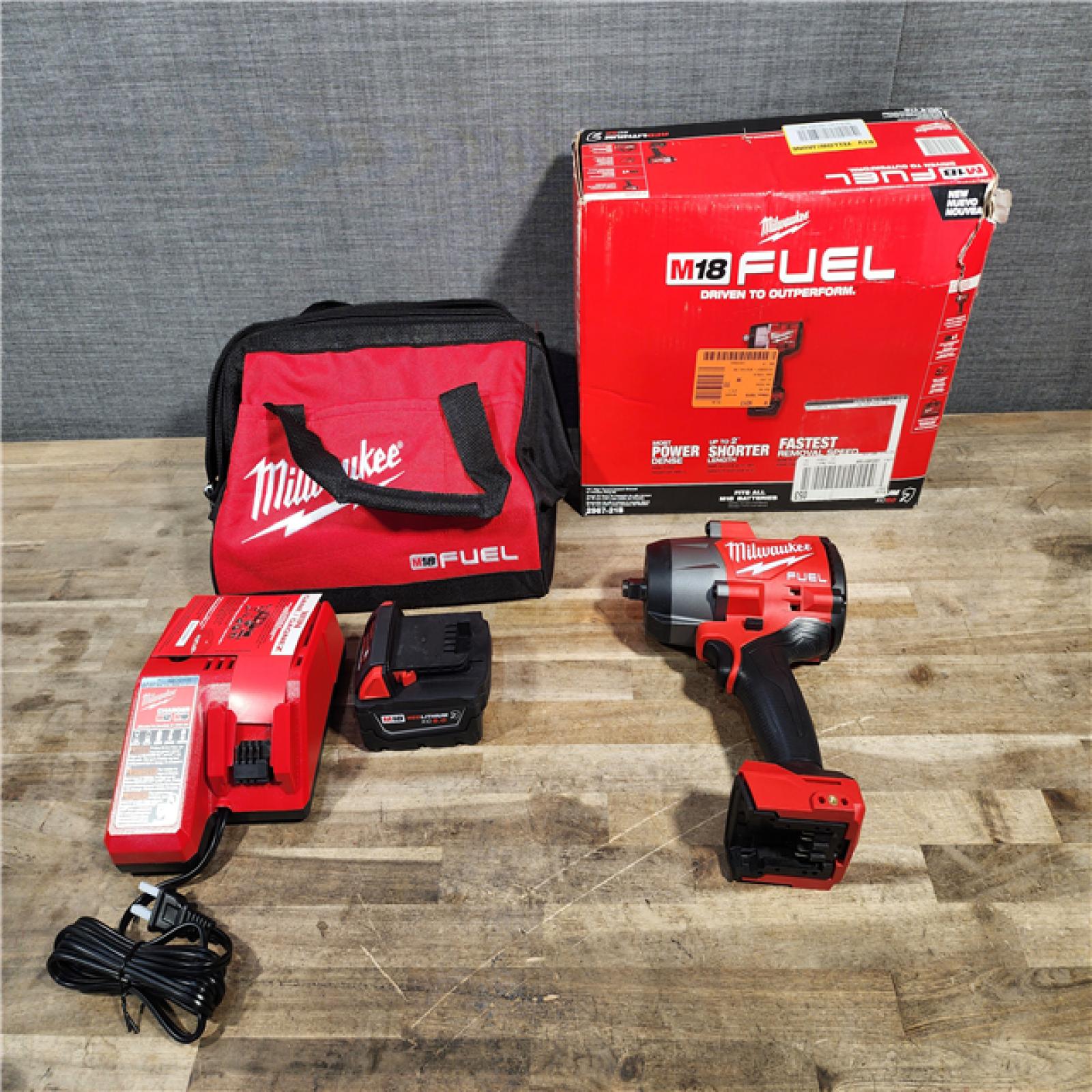 HOUSTON LOCATION - AS-IS (APPEARS LIKE NEW) Milwaukee M18 1/2 in. Cordless Brushless High Torque Impact Wrench Kit (Battery & Charger)