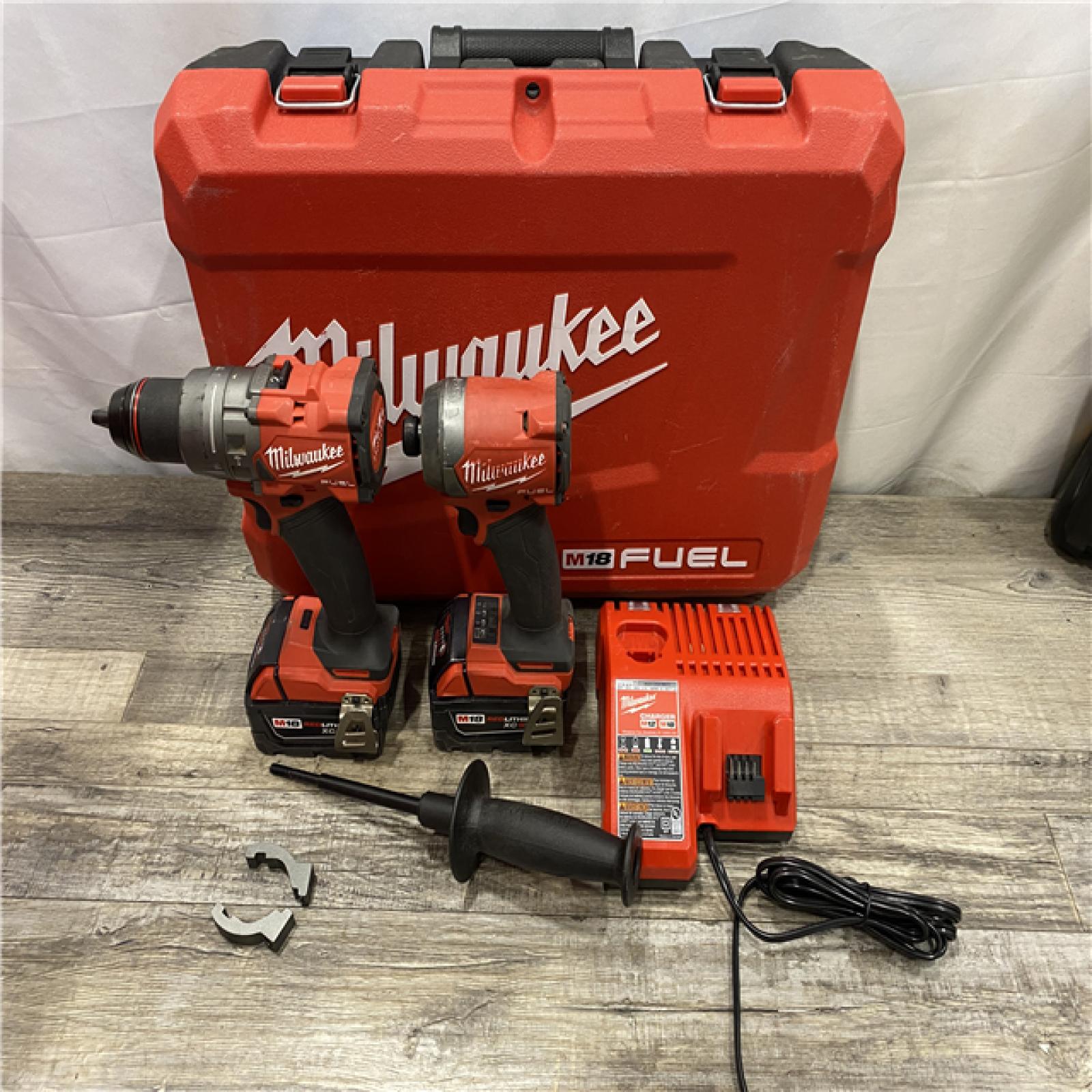 AS-IS Milwaukee FUEL 18V Lithium-Ion Brushless Cordless Hammer Drill and Impact Driver Combo Kit