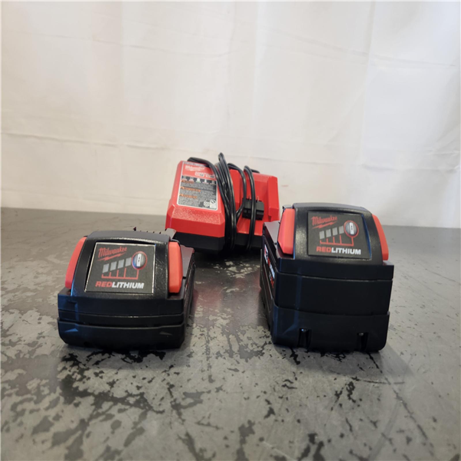 AS-IS- Milwaukee M18 Redlithium Xc5.0 Resistant Battery Starter Kit