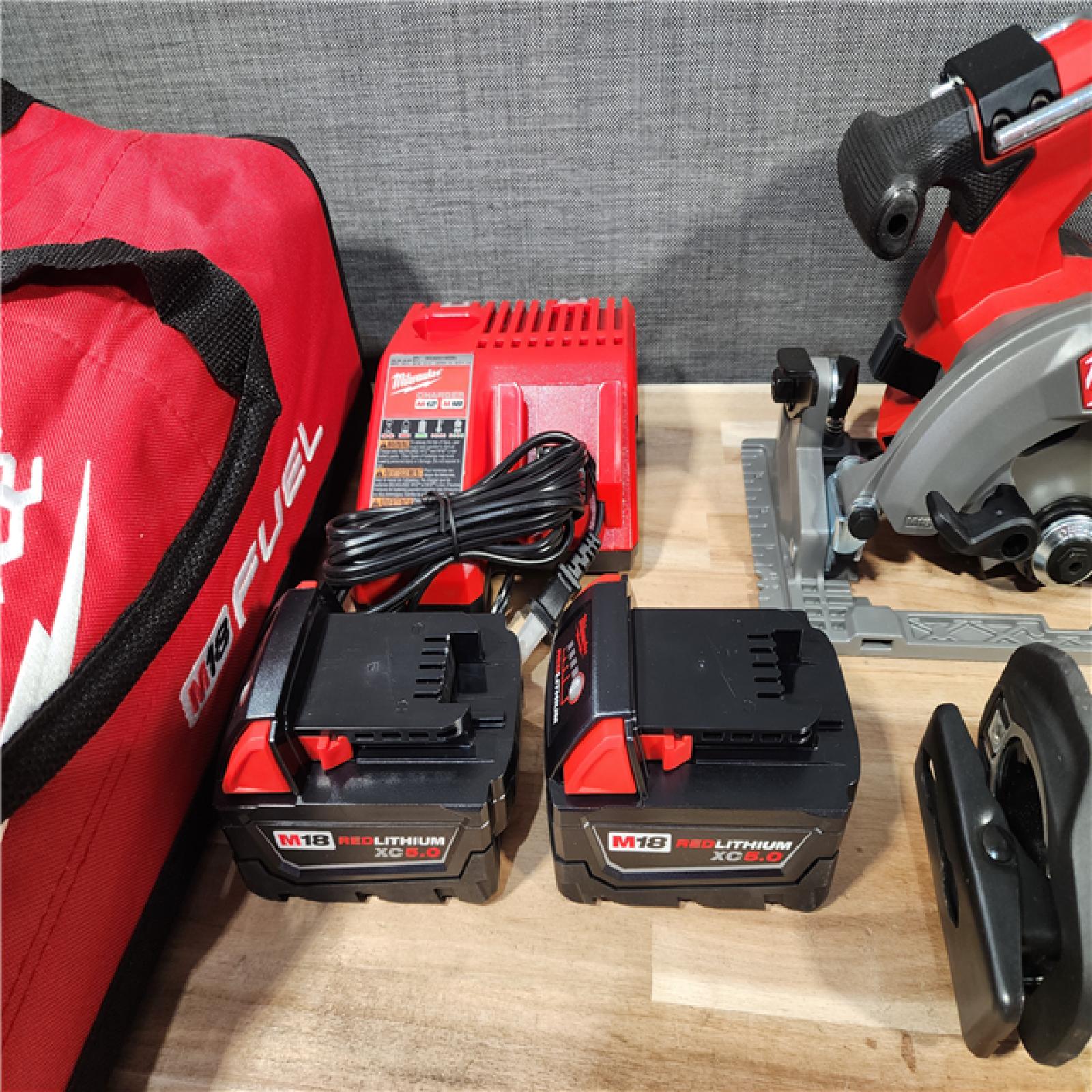 HOUSTON LOCATION - AS-IS M18 FUEL 18V Lithium-Ion Brushless Cordless Combo Kit (5-Tool) with Two 5.0 Ah Batteries  1 Charger 1 Tool Bag