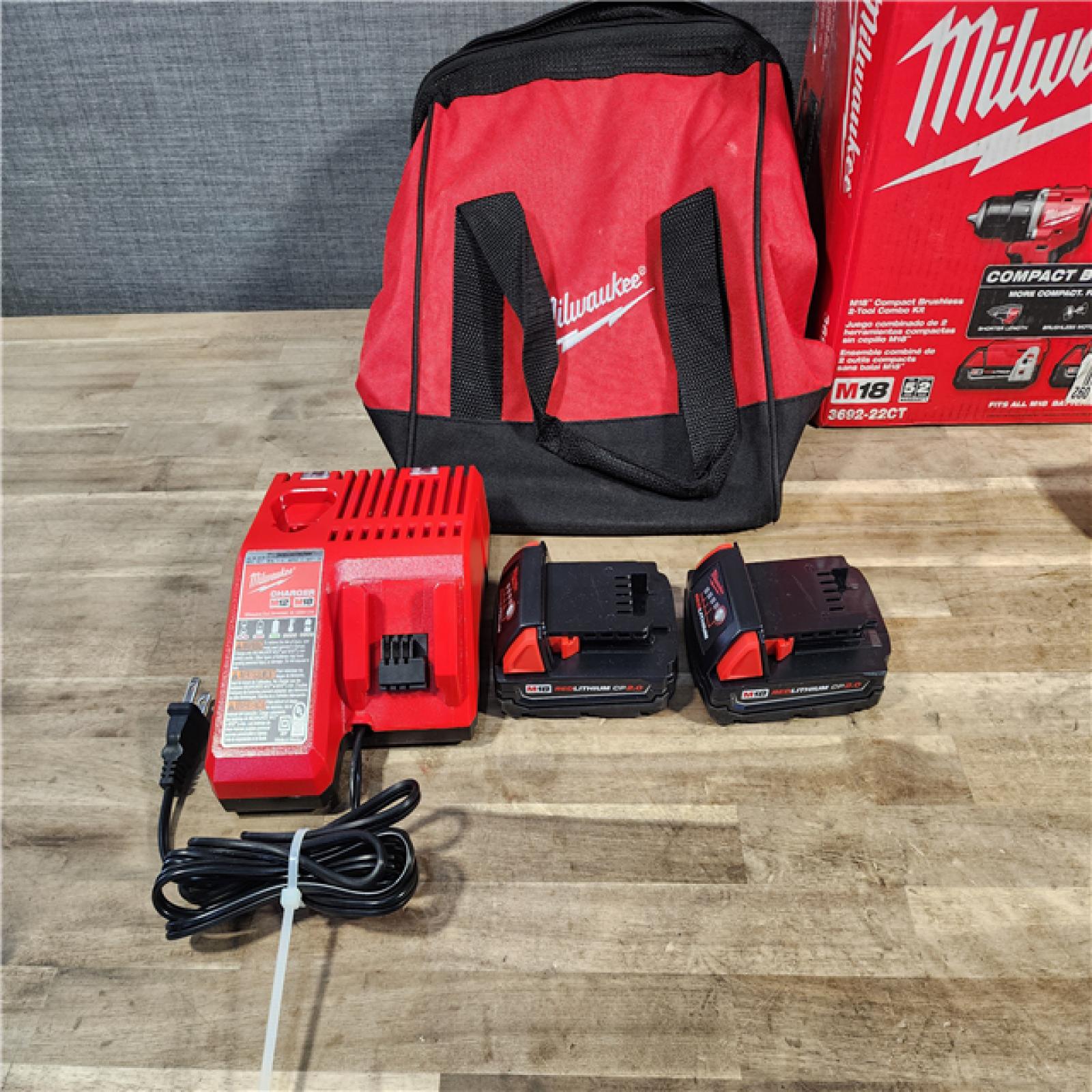HOUSTON LOCATION - AS-IS Milwaukee M18 18V Lithium-Ion Brushless Cordless Compact Drill/Impact Combo Kit (2-Tool) W/(2) 2.0 Ah Batteries, Charger & Bag