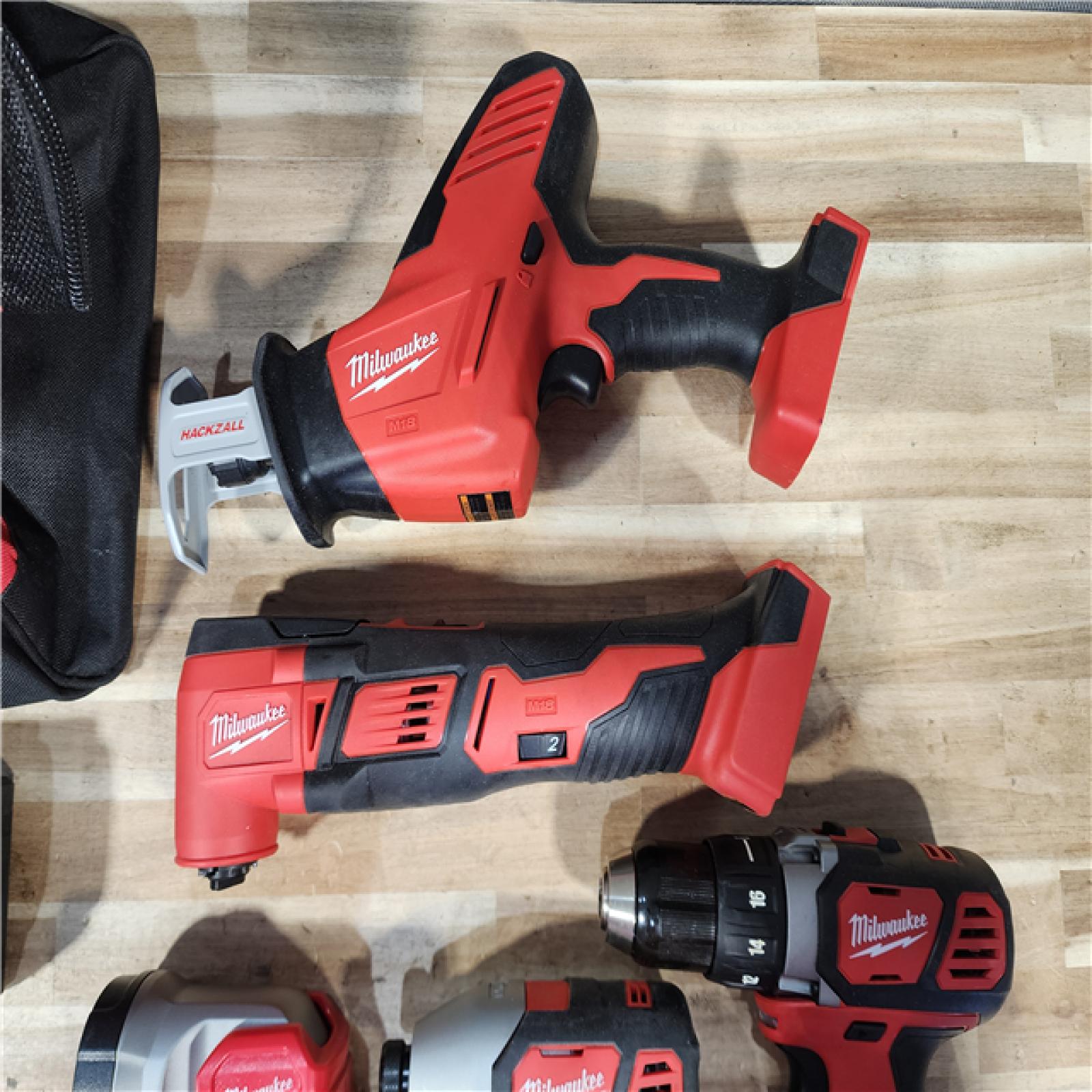 HOUSTON LOCATION - AS-IS Milwaukee 5 Tool Combo Kit W/ (2) Battery & Charger