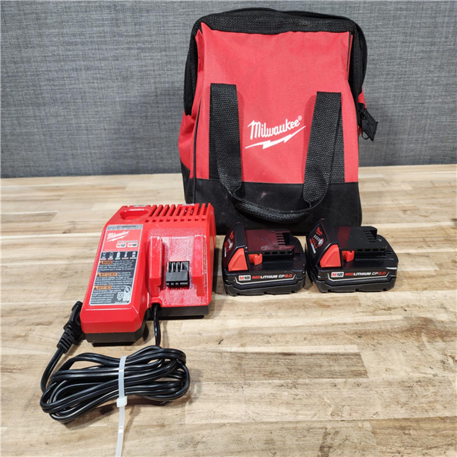 HOUSTON LOCATION - AS-IS Milwaukee  18V Lithium-Ion Brushless Cordless Compact Drill/Impact Combo Kit