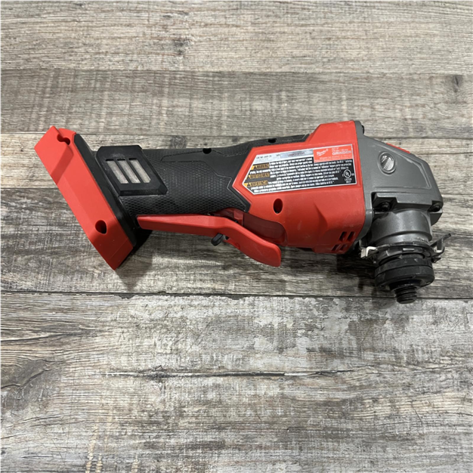AS-IS Milwaukee FUEL 18V Lithium-Ion Brushless Cordless 4-1/2 in./5 in. Grinder w/Paddle Switch (Tool-Only)