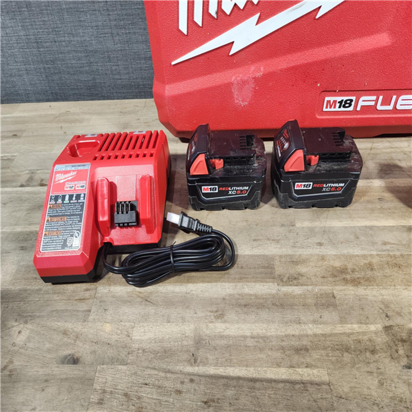 HOUSTON LOCATION - AS-IS MILWAUKEE FUEL 18V Lithium-Ion Brushless Cordless Hammer Drill and Impact Driver Combo Kit (2-Tool) with 2 Batteries