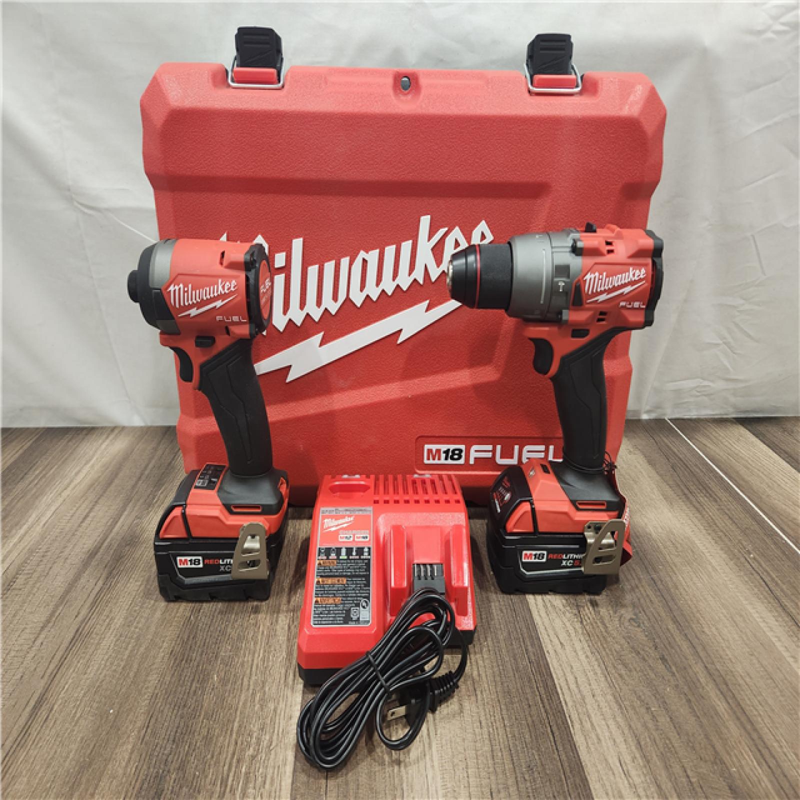 AS-IS- MILWAUKEE FUEL 18V Lithium-Ion Brushless Cordless Hammer Drill and Impact Driver Combo Kit