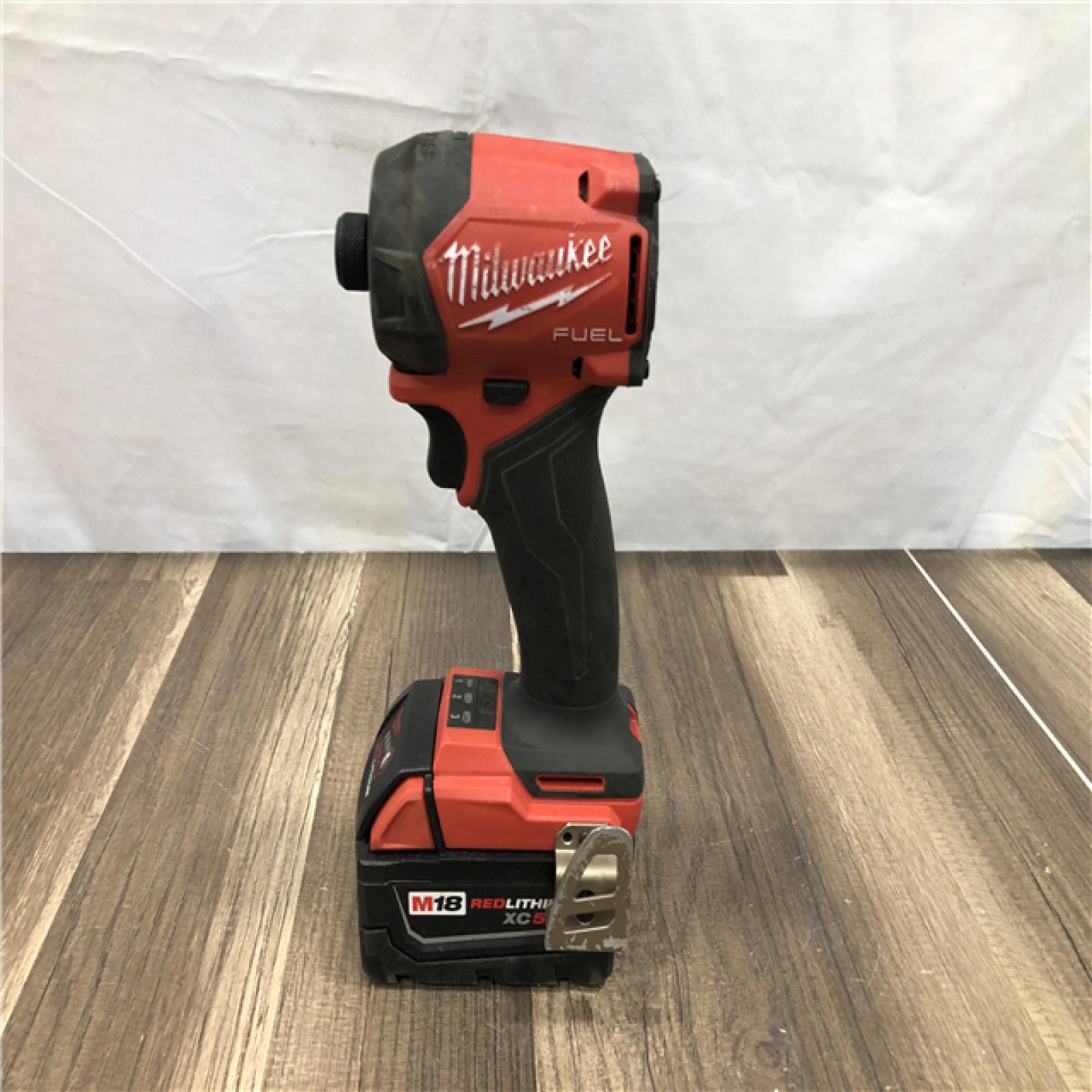 AS-IS Milwaukee FUEL SURGE 18V Lithium-Ion Brushless Cordless 1/4 in. Hex Impact Driver Kit