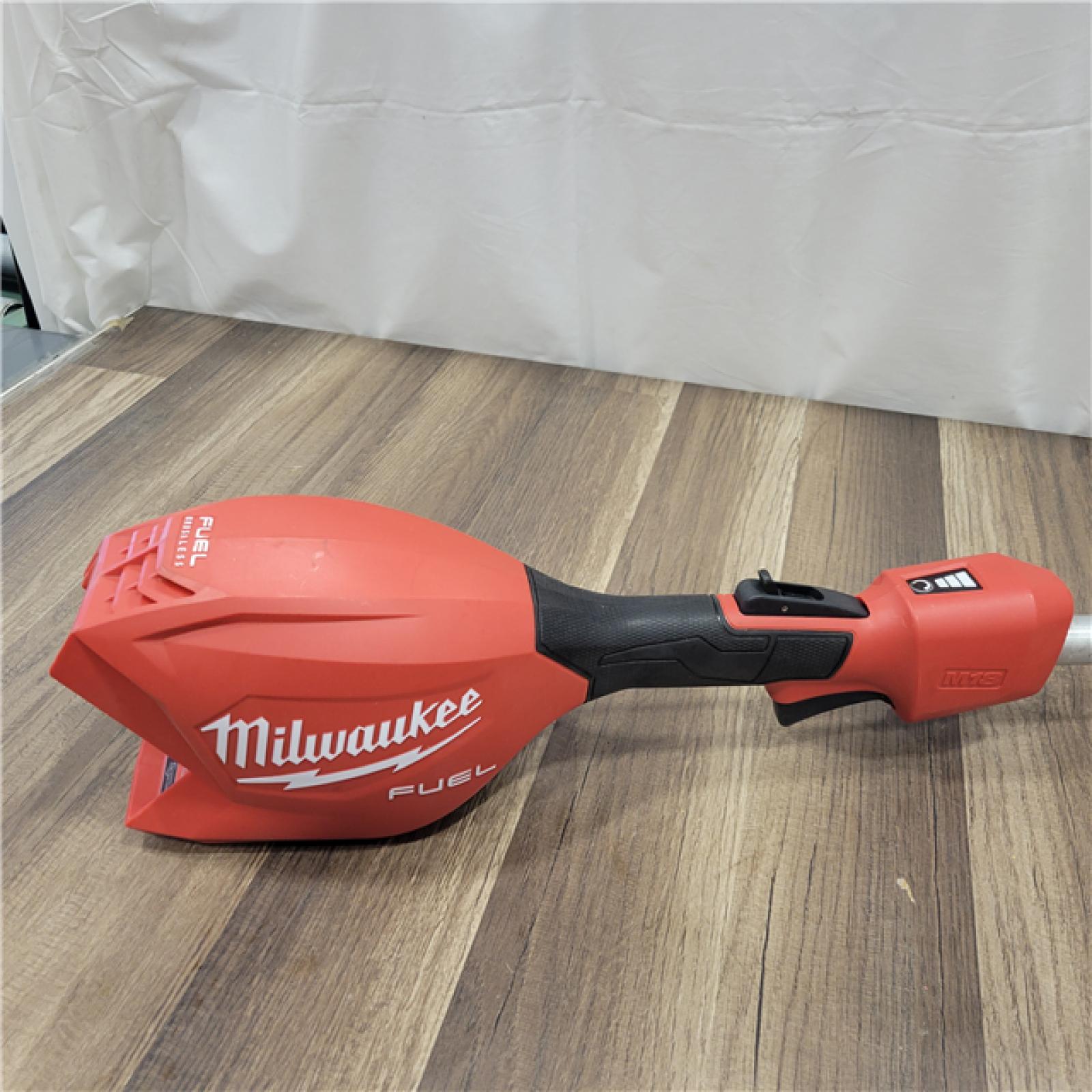 AS-IS MILWAUKEE   M18 FUEL 18V 16 in. Brushless Cordless Battery Powered String Trimmer W/QUIK-LOK Attachment Capability & 8.0 Ah Battery