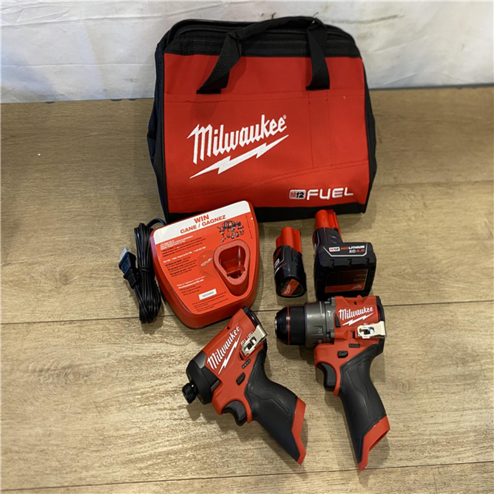 AS-IS Milwaukee FUEL 12-Volt Lithium-Ion Brushless Cordless Hammer Drill and Impact Driver Combo Kit