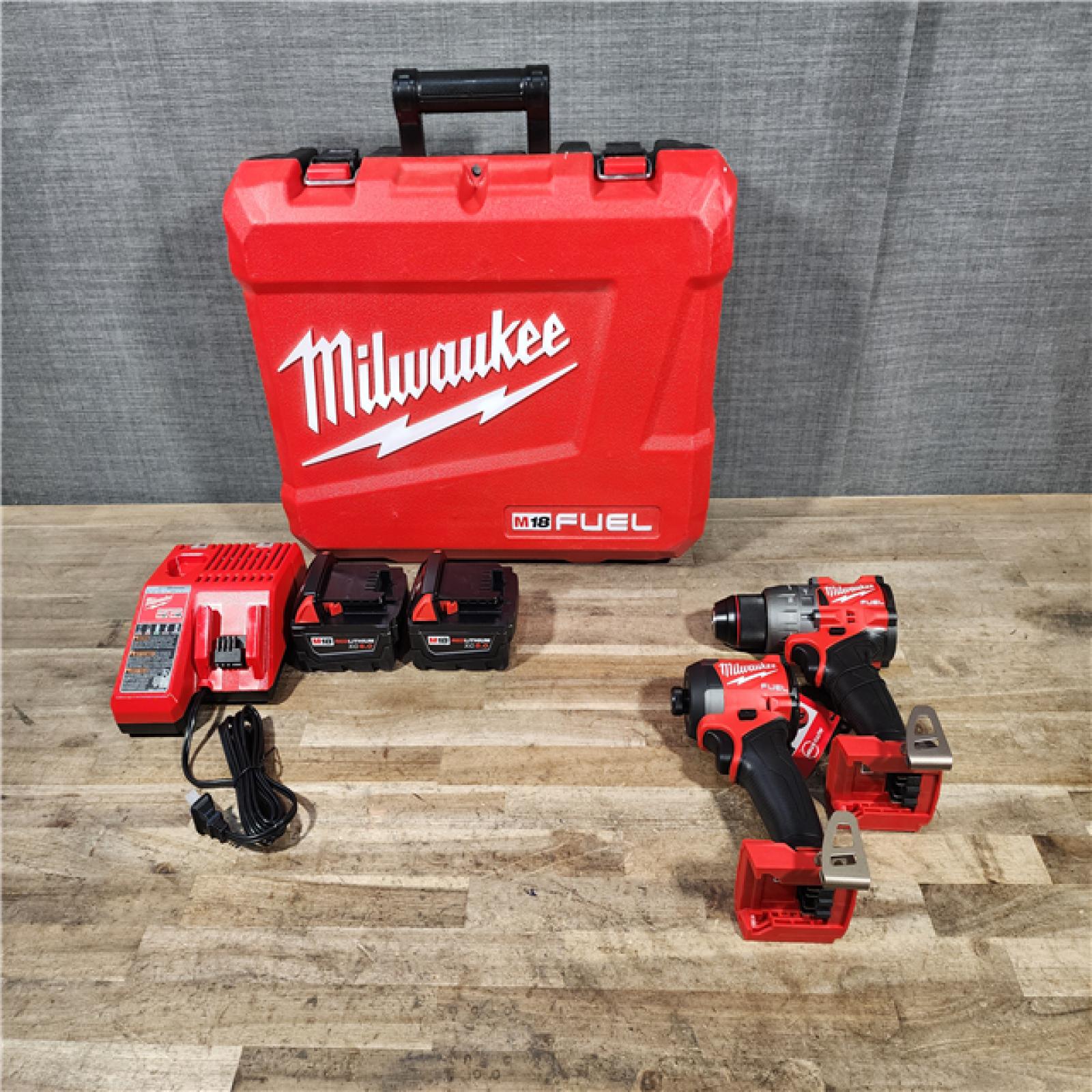 HOUSTON LOCATION - AS-IS (APPEARS LIKE NEW) Milwaukee FUEL 18V Lithium-Ion Brushless Cordless Hammer Drill and Impact Driver Combo Kit