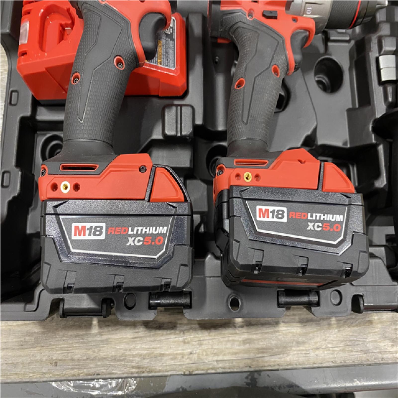 AS-IS Milwaukee FUEL 18V Lithium-Ion Brushless Cordless Hammer Drill and Impact Driver Combo Kit